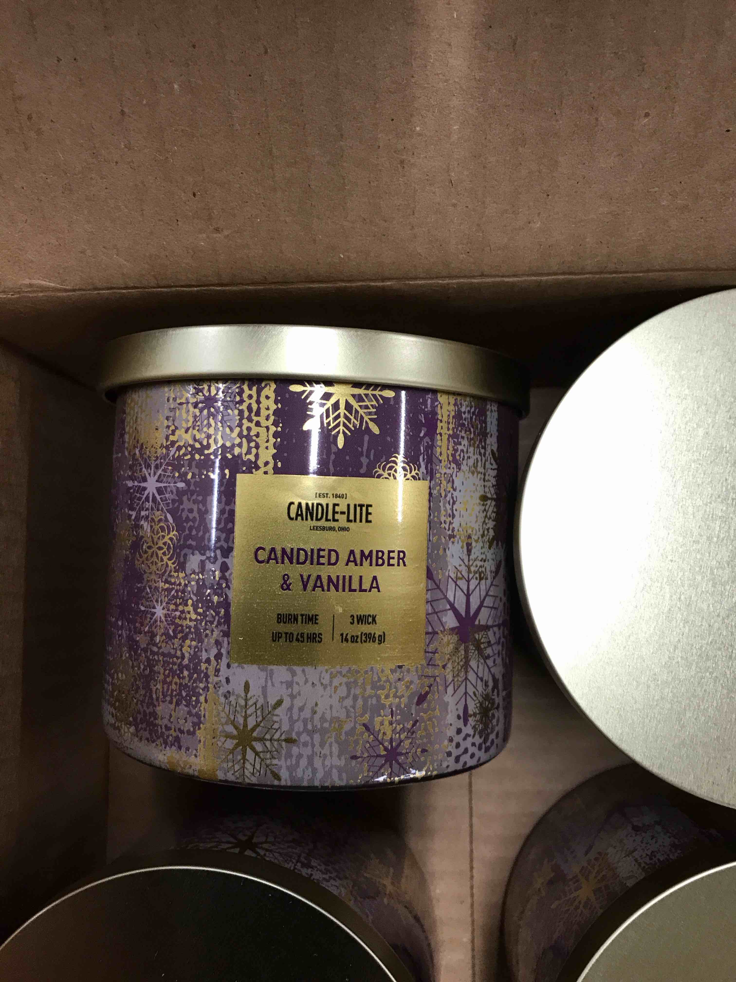 Condition photo showing New/Like New for Candle-Lite Candied Amber and Vanilla Candles.  Set of 4