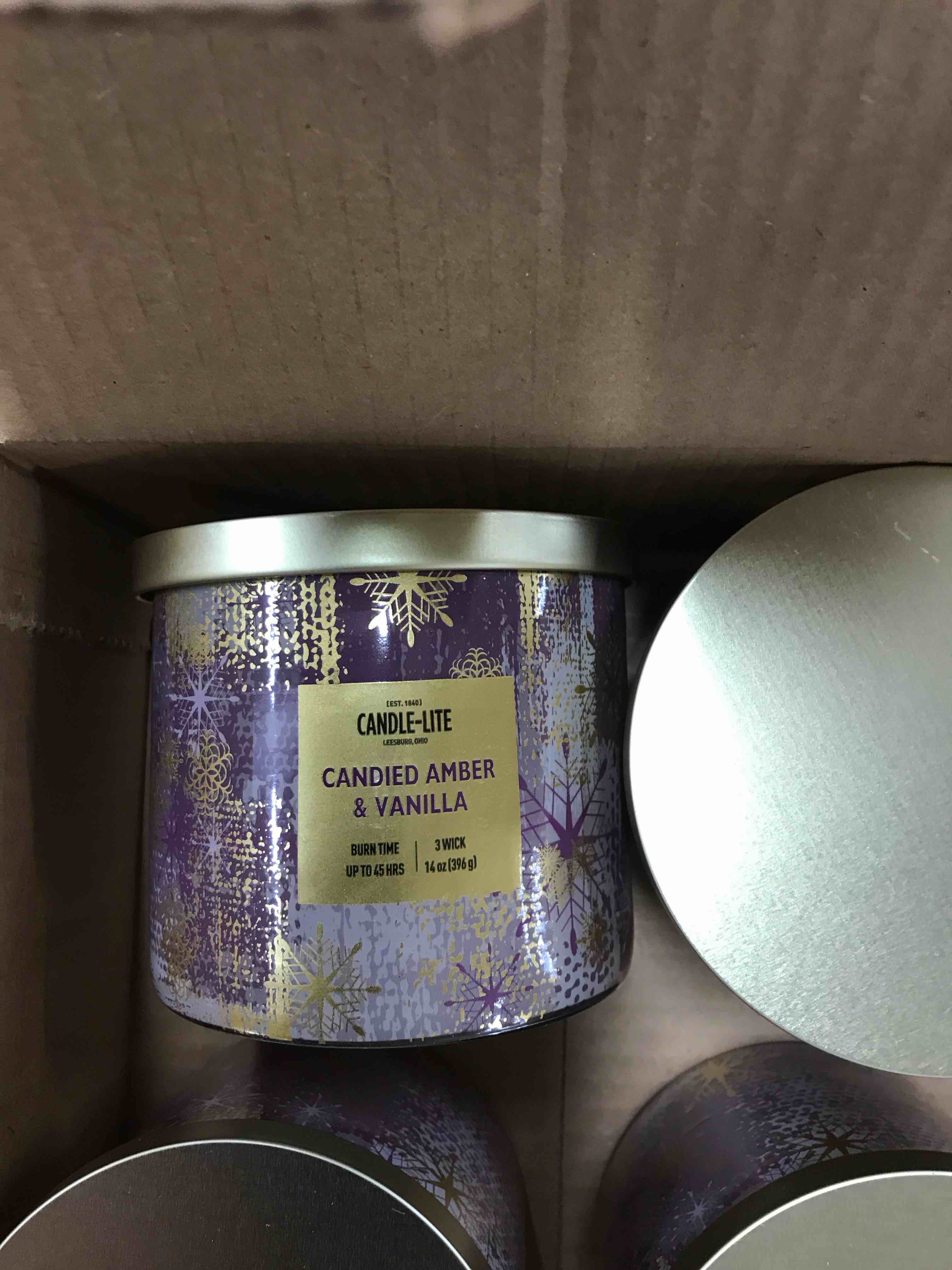 Condition photo showing New/Like New for Candle-Lite Candied Amber and Vanilla Candles.  Set of 4