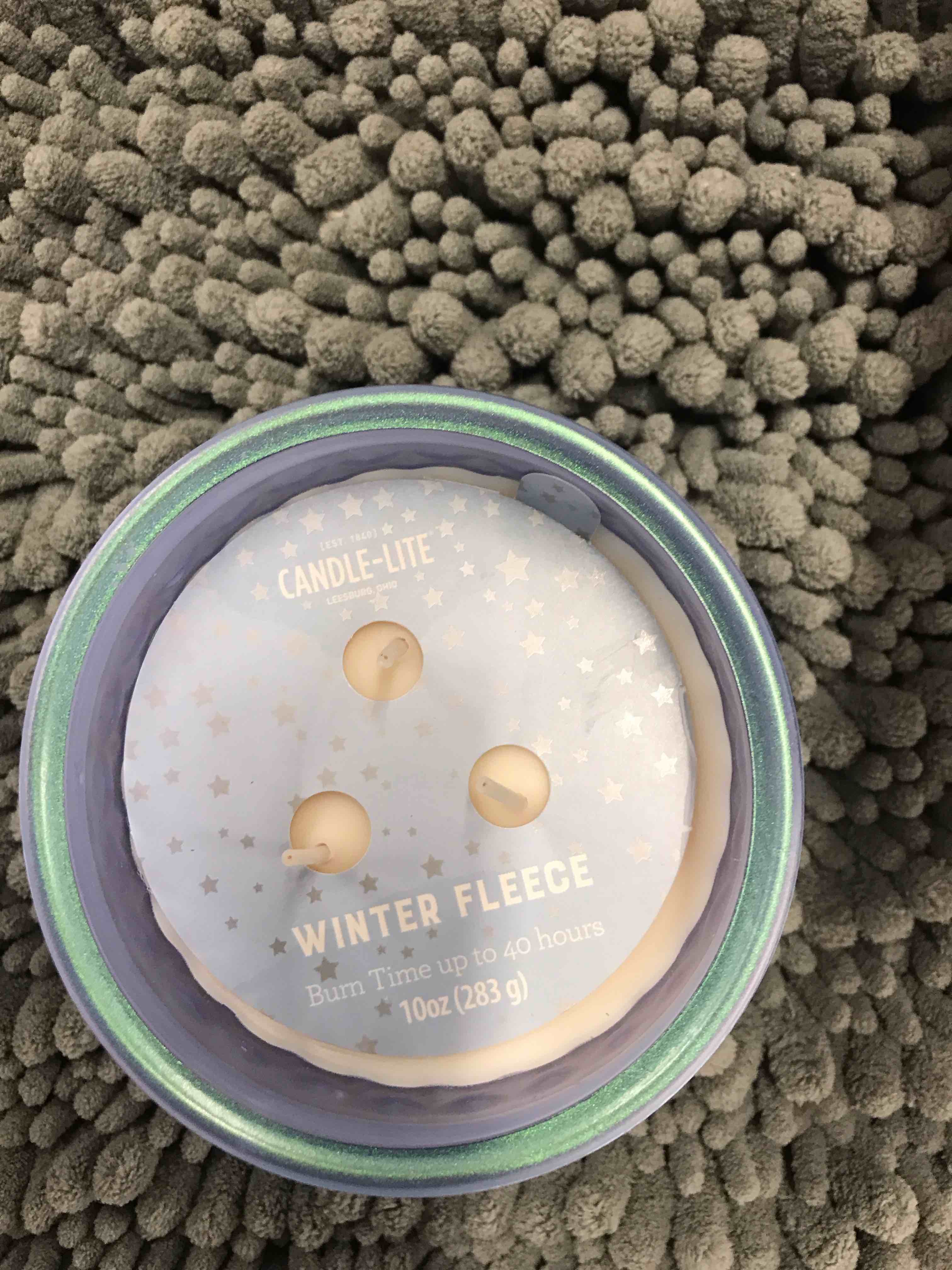 Condition photo showing New/Like New for Candle-Lite Winter Fleece Candles.  Set of 4