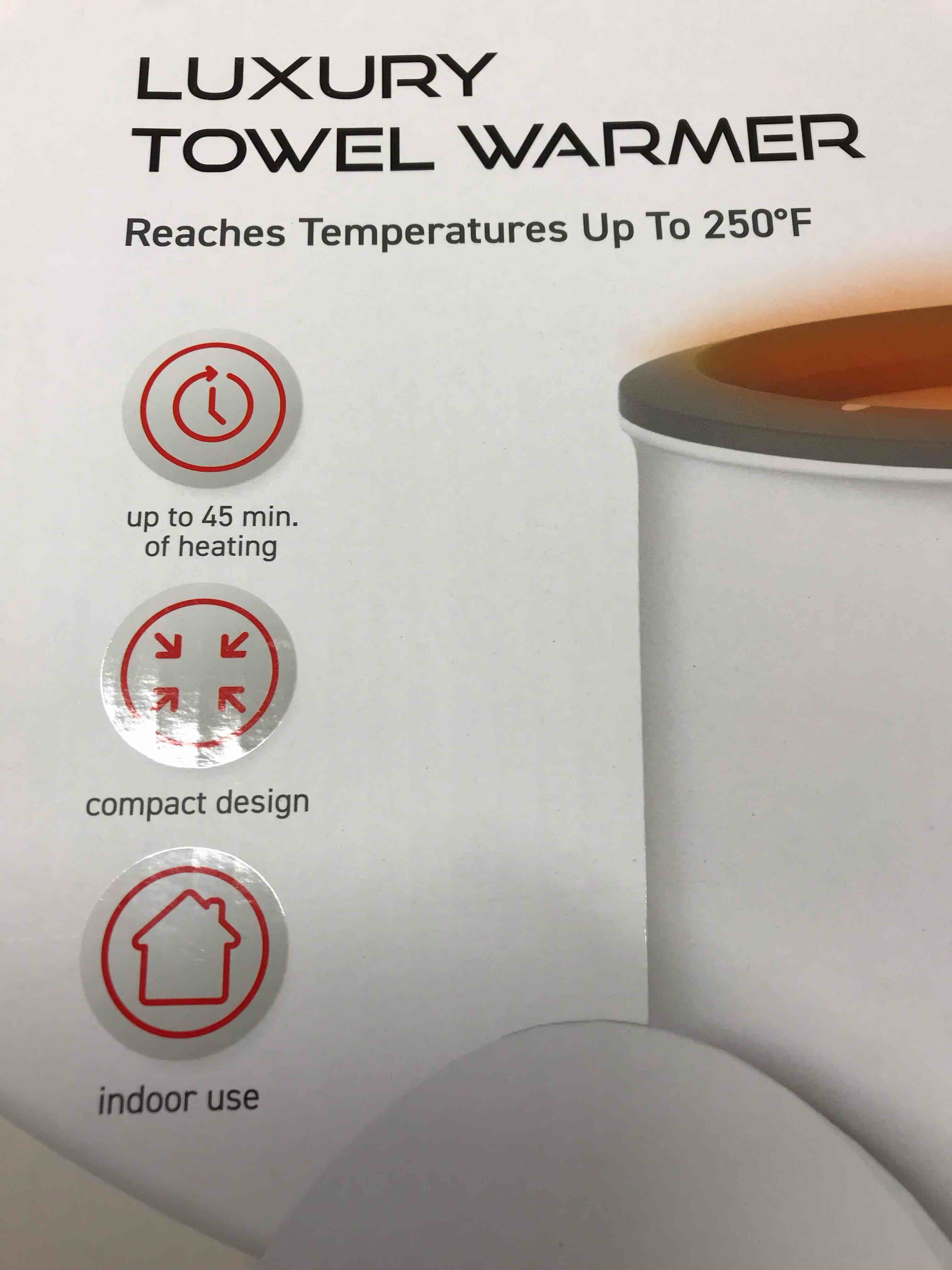 Condition photo showing As Is for Iconic Towel Warmer