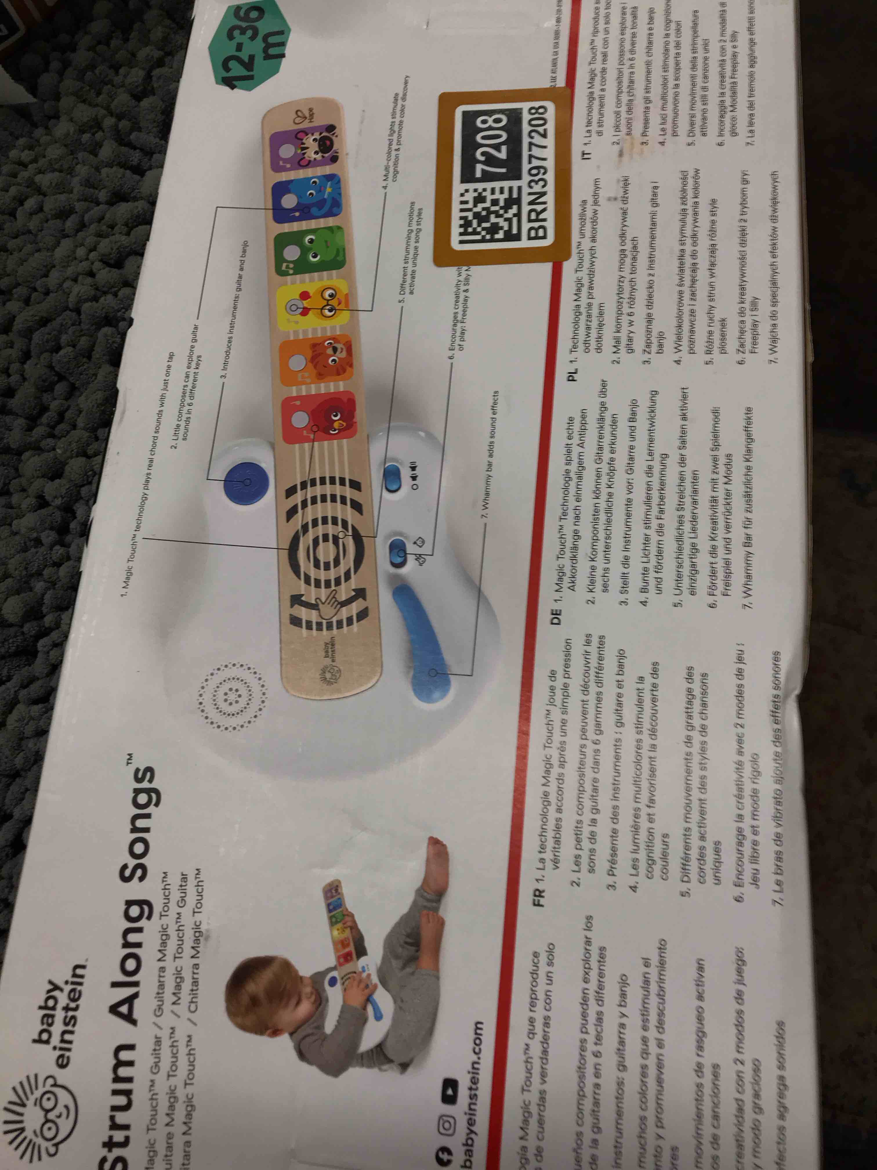 Condition photo showing As Is for Baby Einstein Strum Along Songs Magic Touch Musical Wooden Electronic Guitar Toy, 12 Months and Up