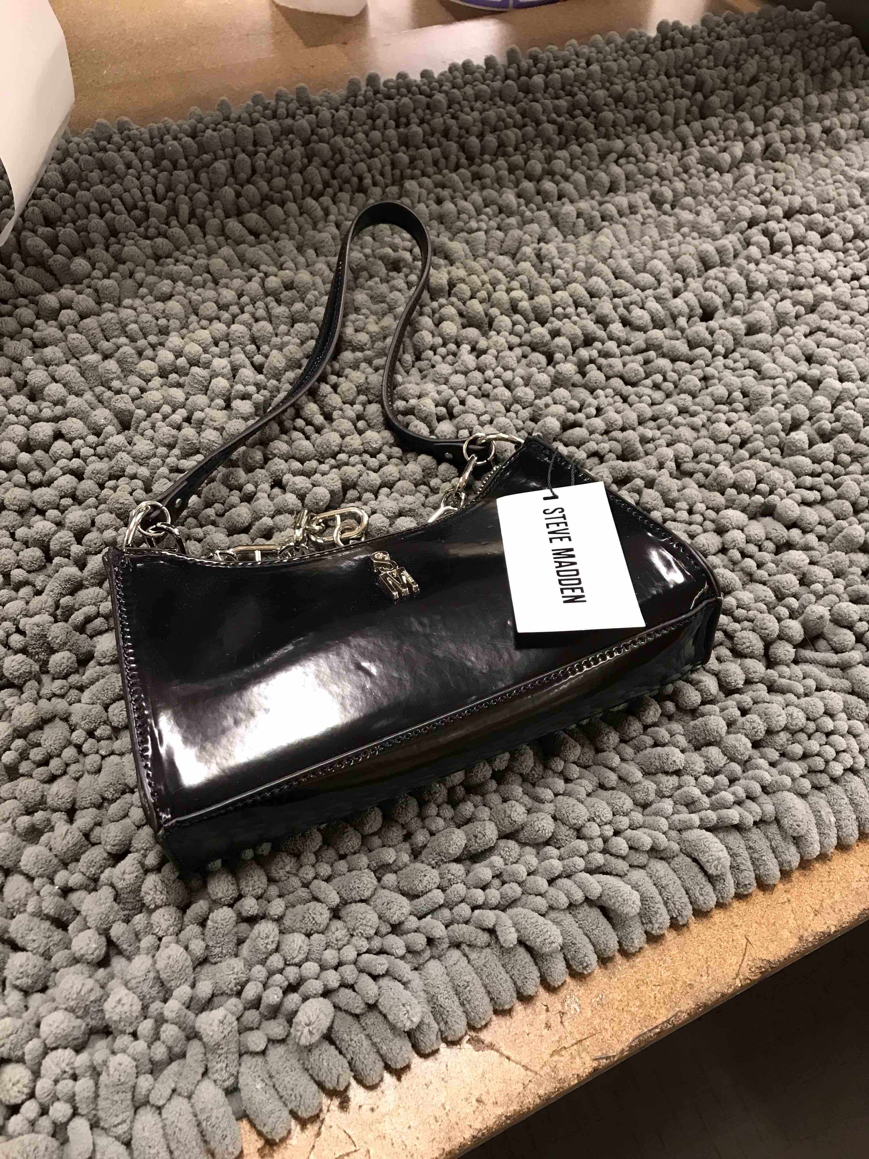 Condition photo showing As Is for Steve Madden black purse