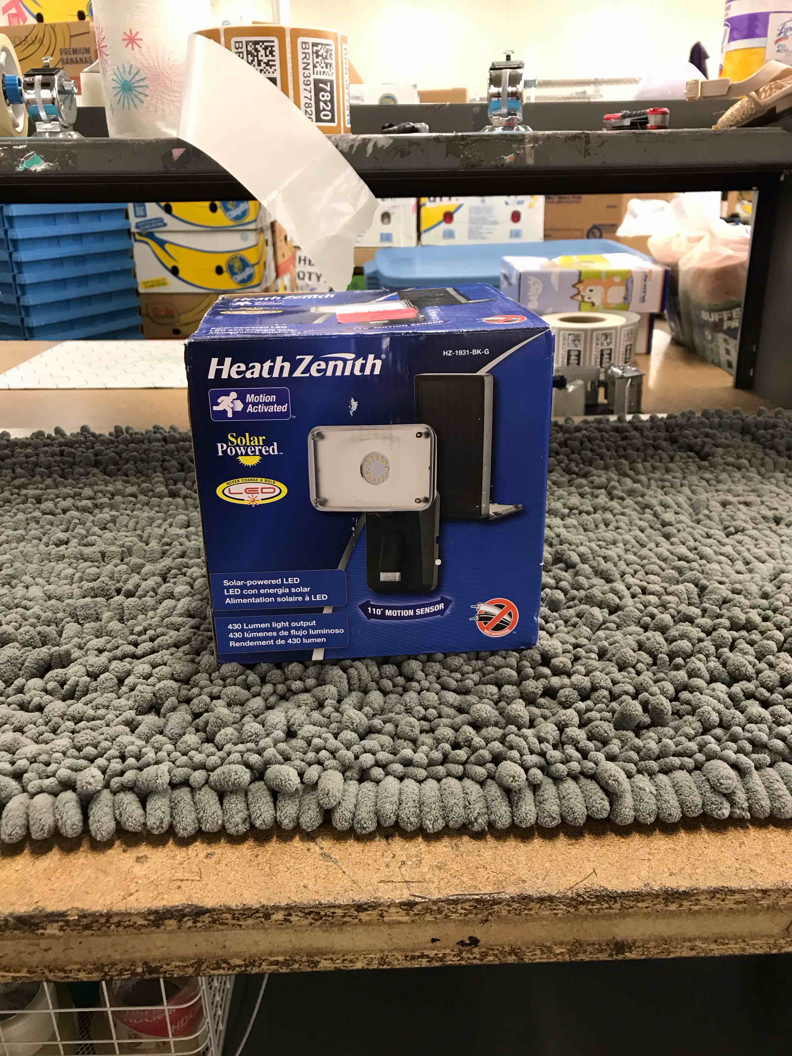 Condition photo showing As Is for motion activated solar light