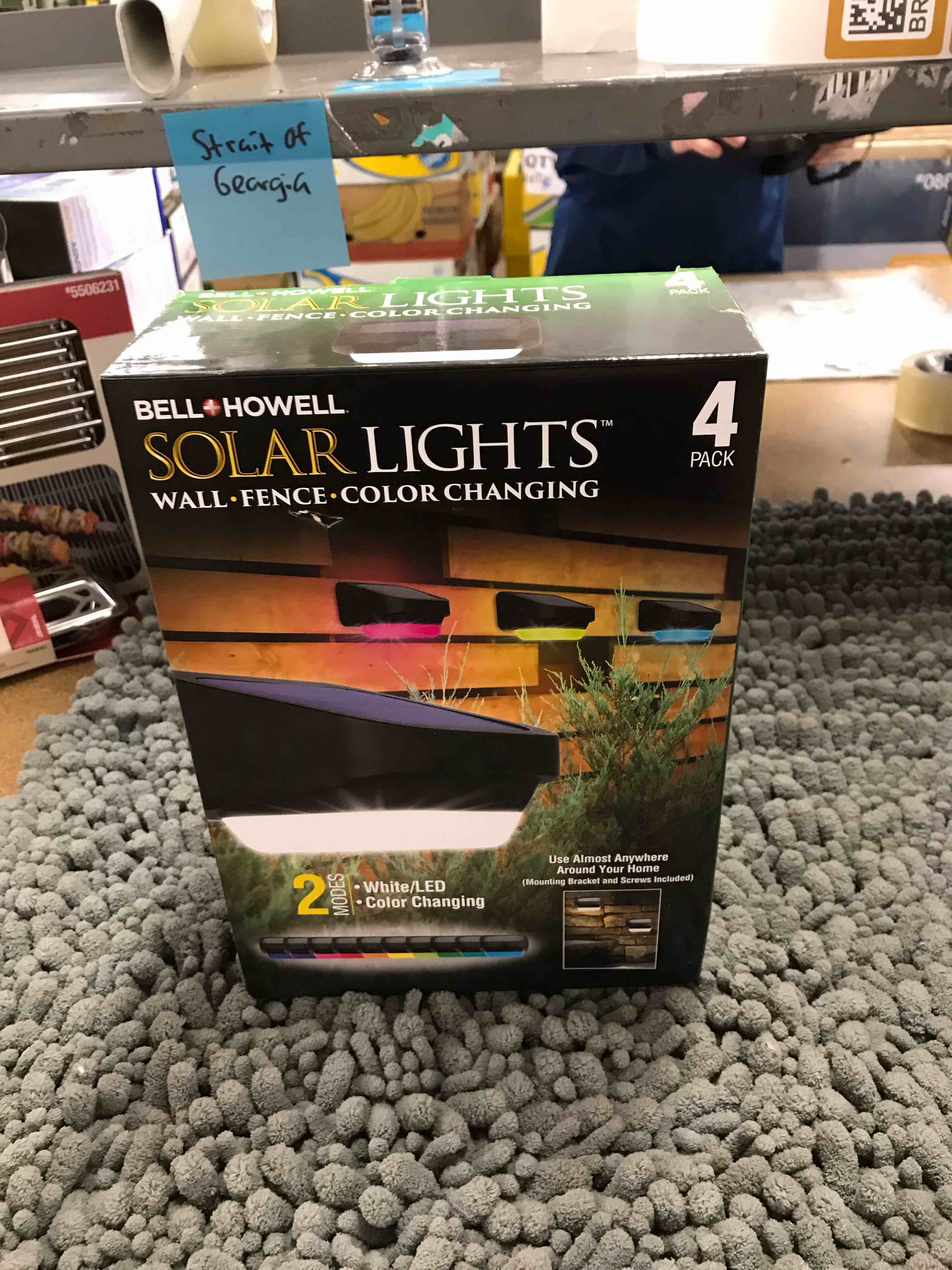 Condition photo showing As Is for 4 pack solar lights