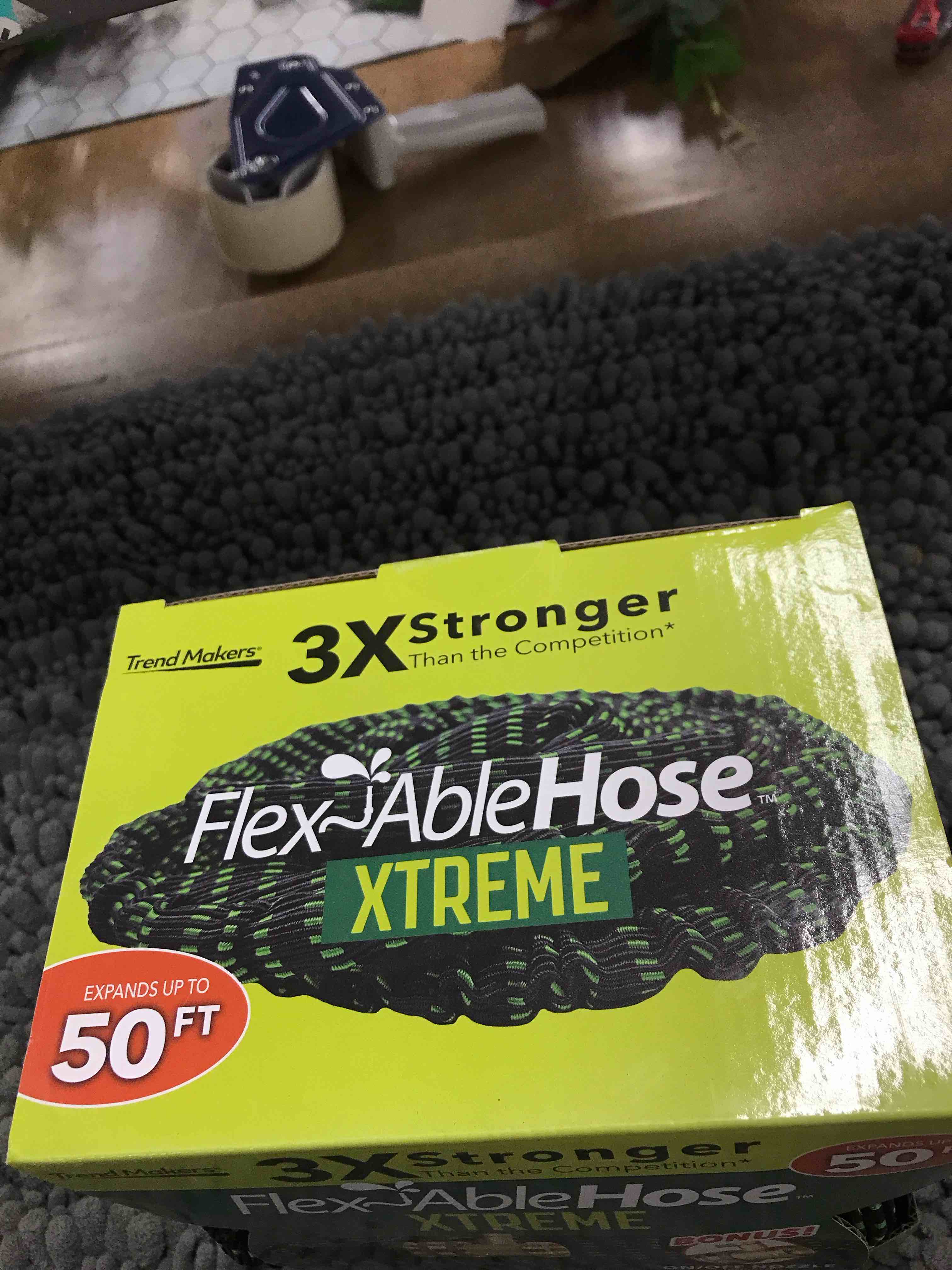 Condition photo showing New/Like New for 50 ft flexible hose