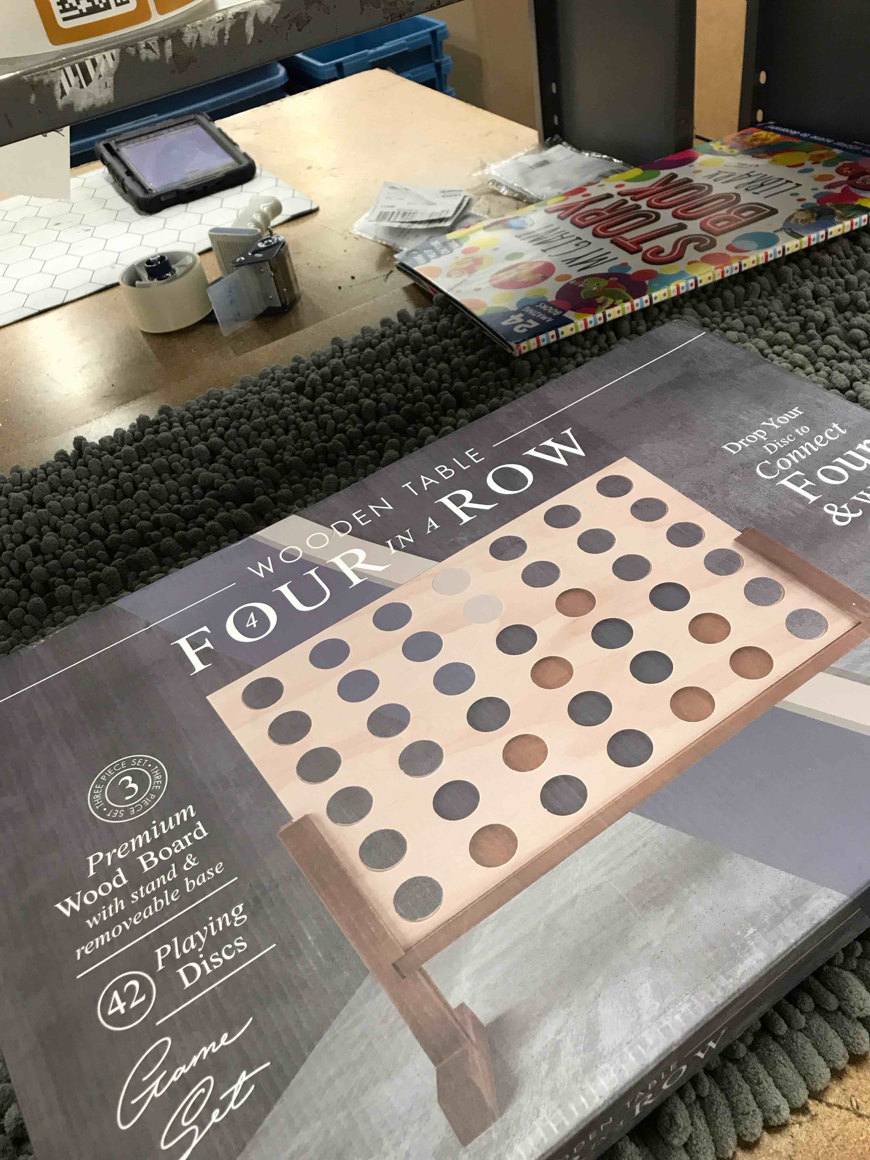 Condition photo showing New/Like New for connect 4 wooden table