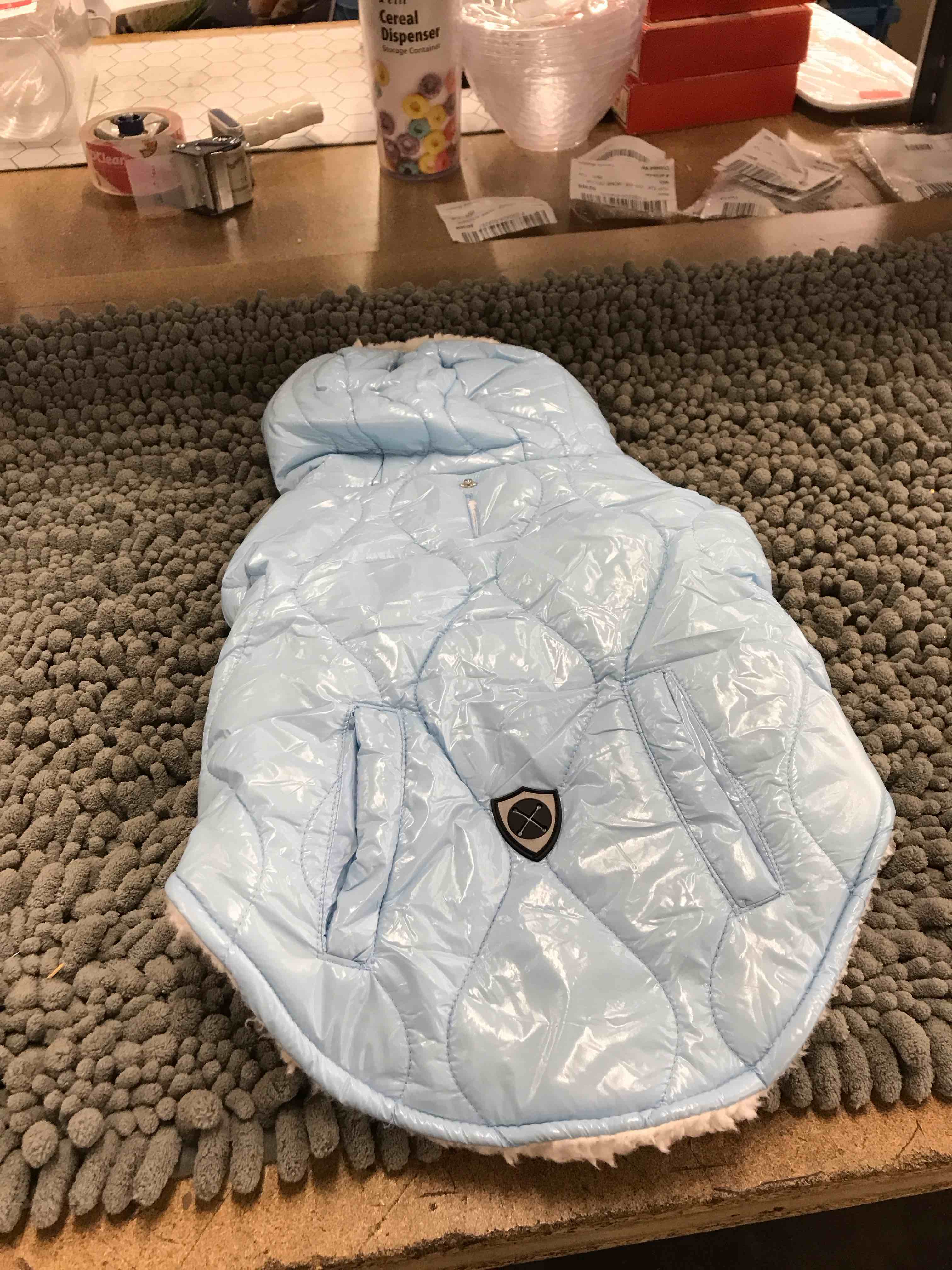 Condition photo showing New/Like New for size medium blue dog coat