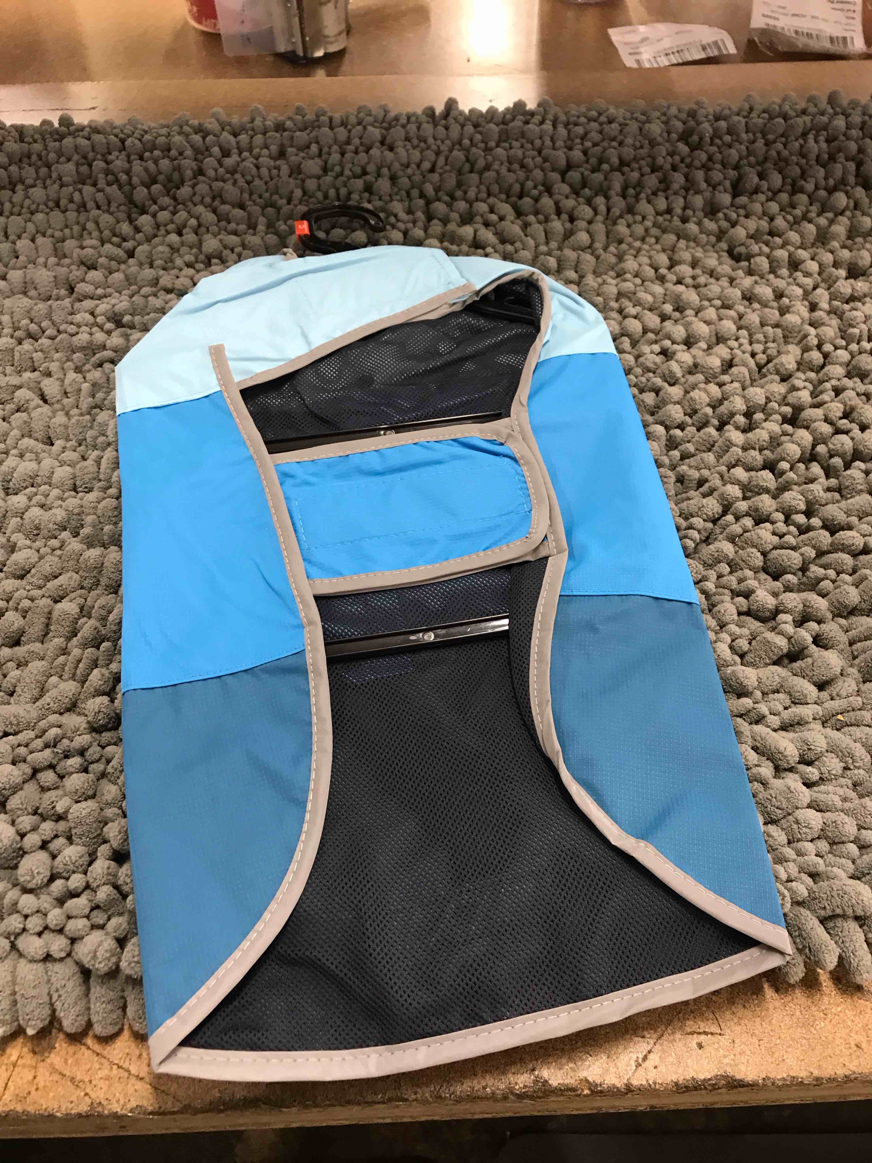 Condition photo showing New/Like New for pet raincoat