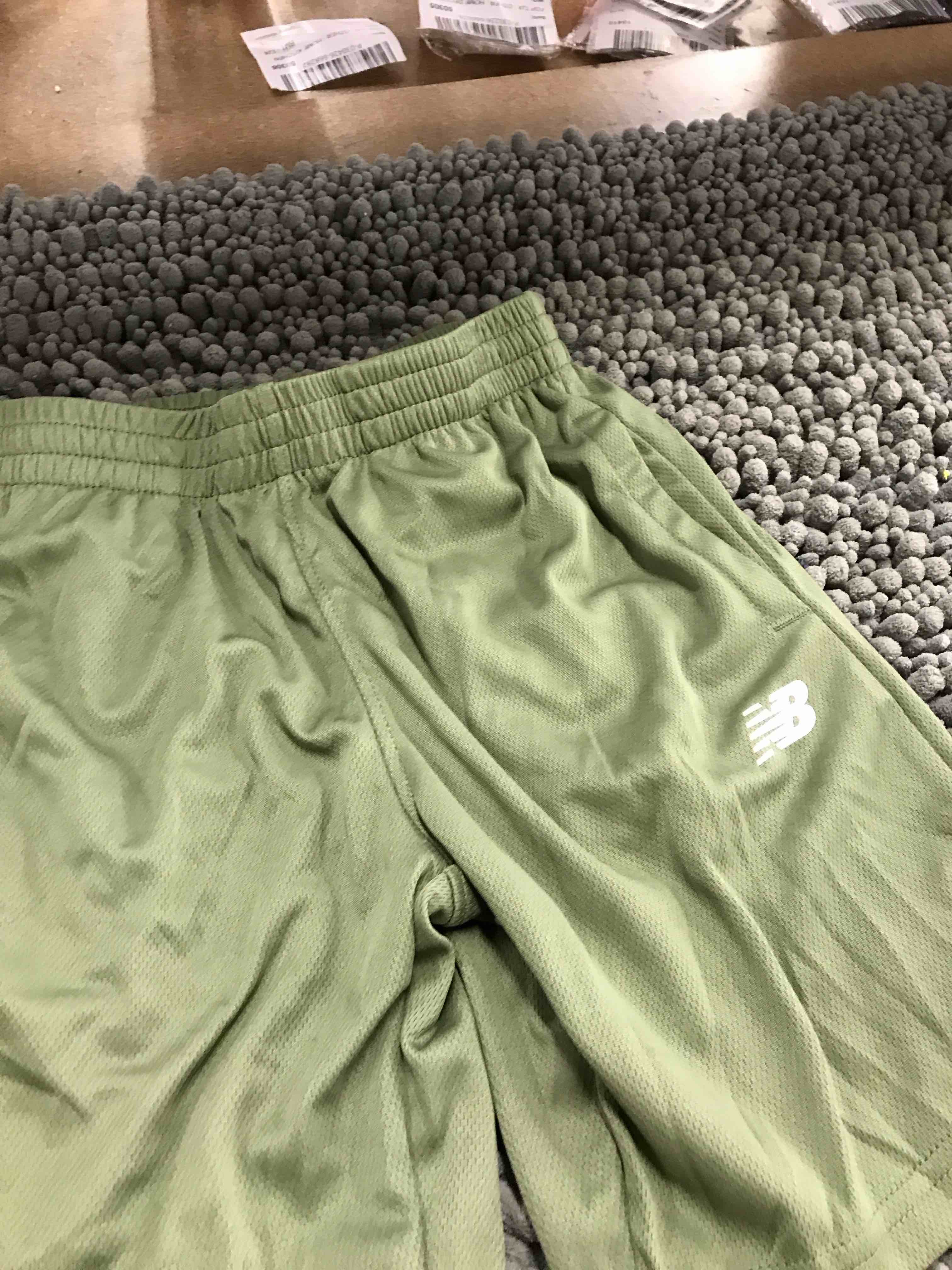 Condition photo showing Good Condition for new balance kids shorts