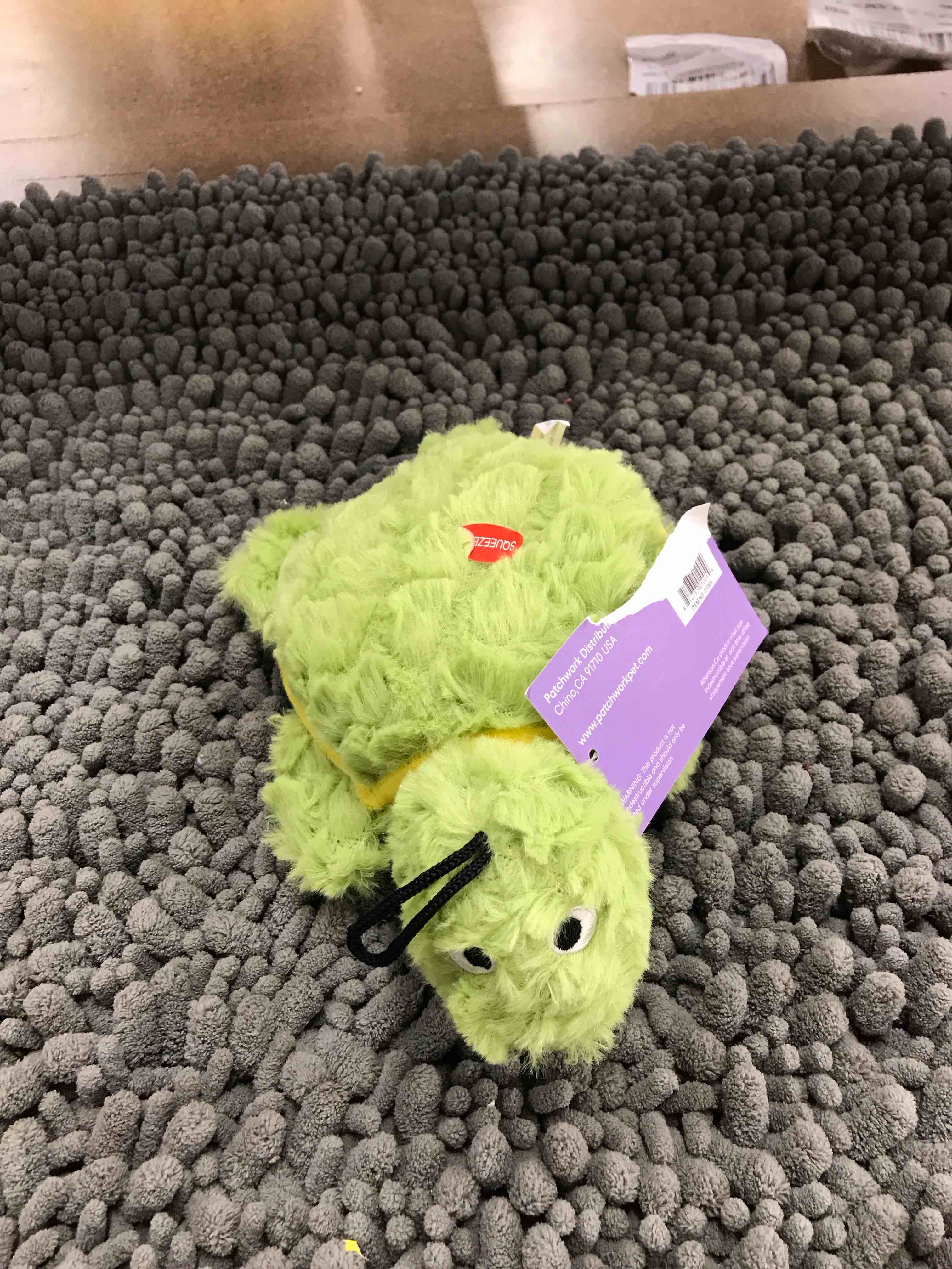 Condition photo showing New/Like New for squeaky dog toy