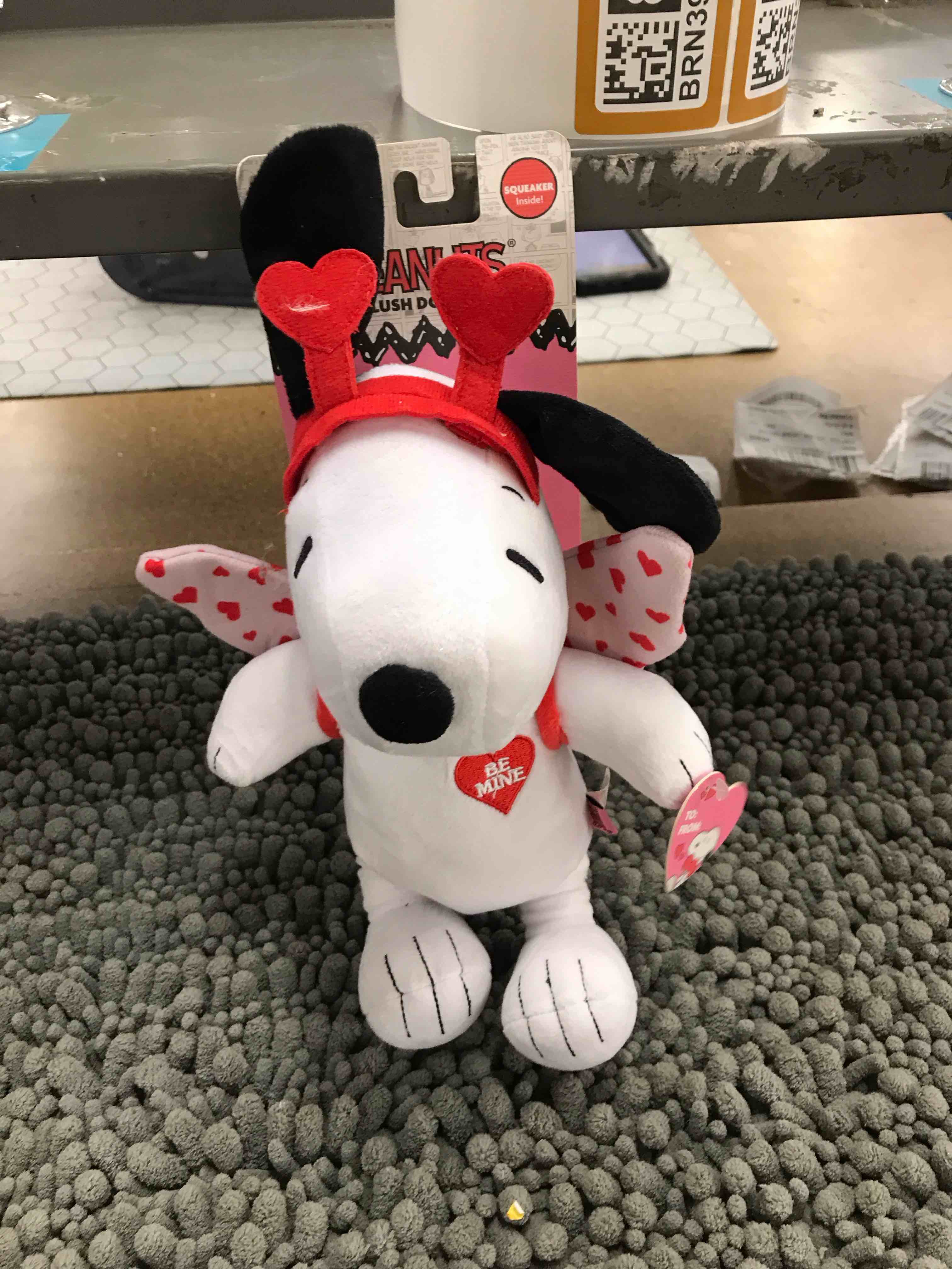 Condition photo showing New/Like New for snoopy plush dog toy
