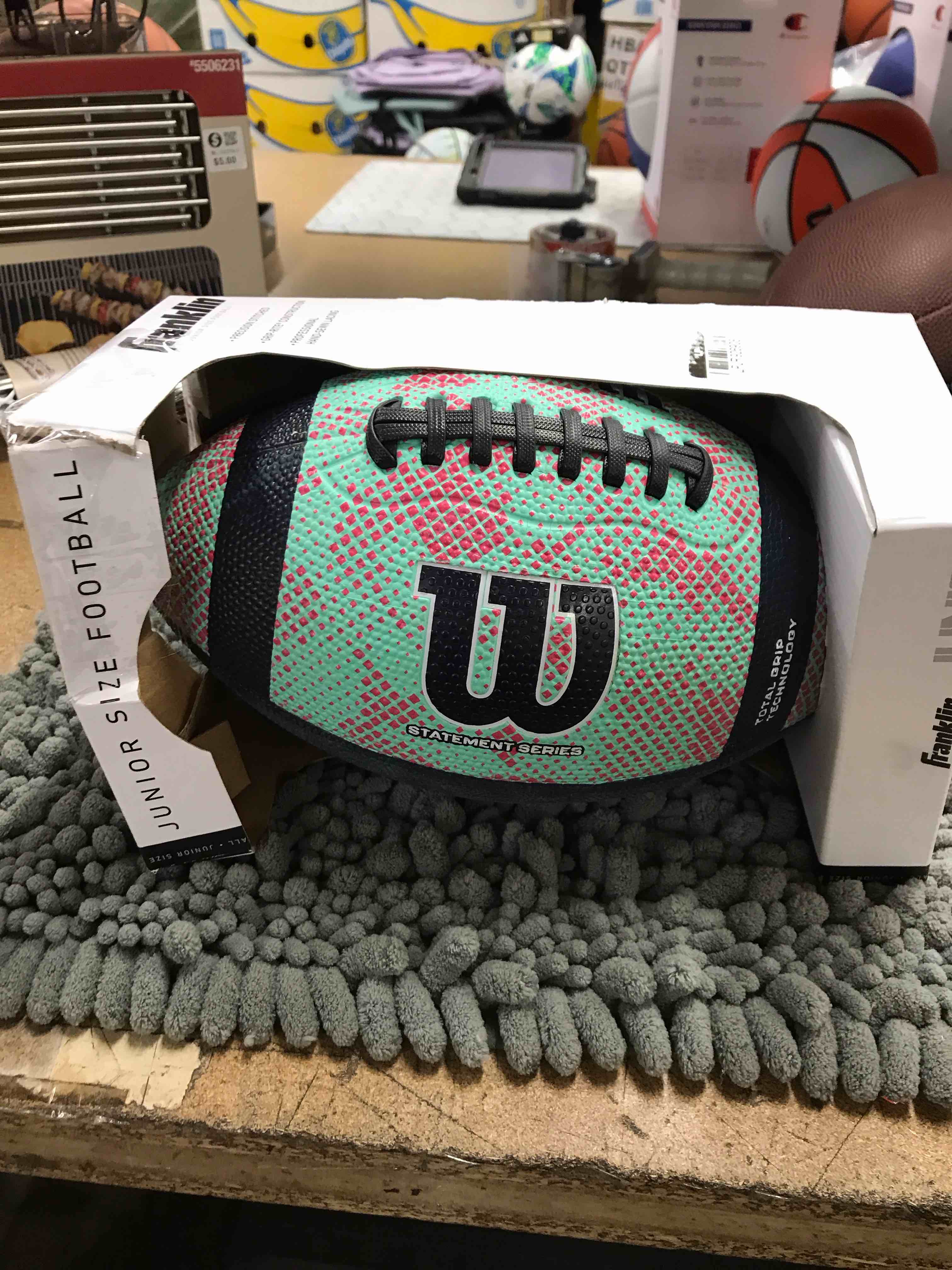 Condition photo showing New/Like New for WILSON NCAA Statement Geo Football - Junior, Orange