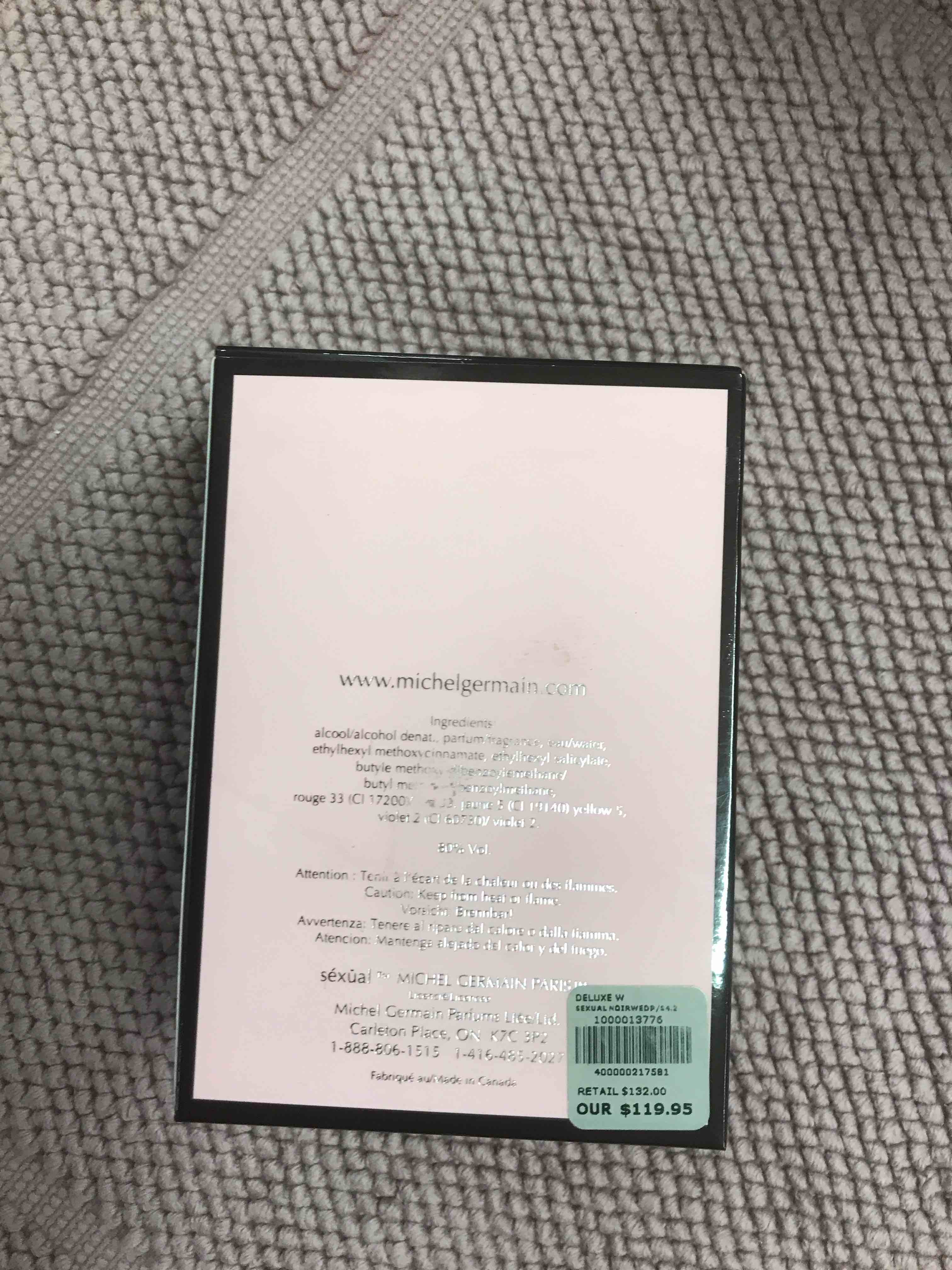 Condition photo showing New/Like New for Michel Germain Sexual Noir Eau De Parfum Spray for Women 4.2 oz