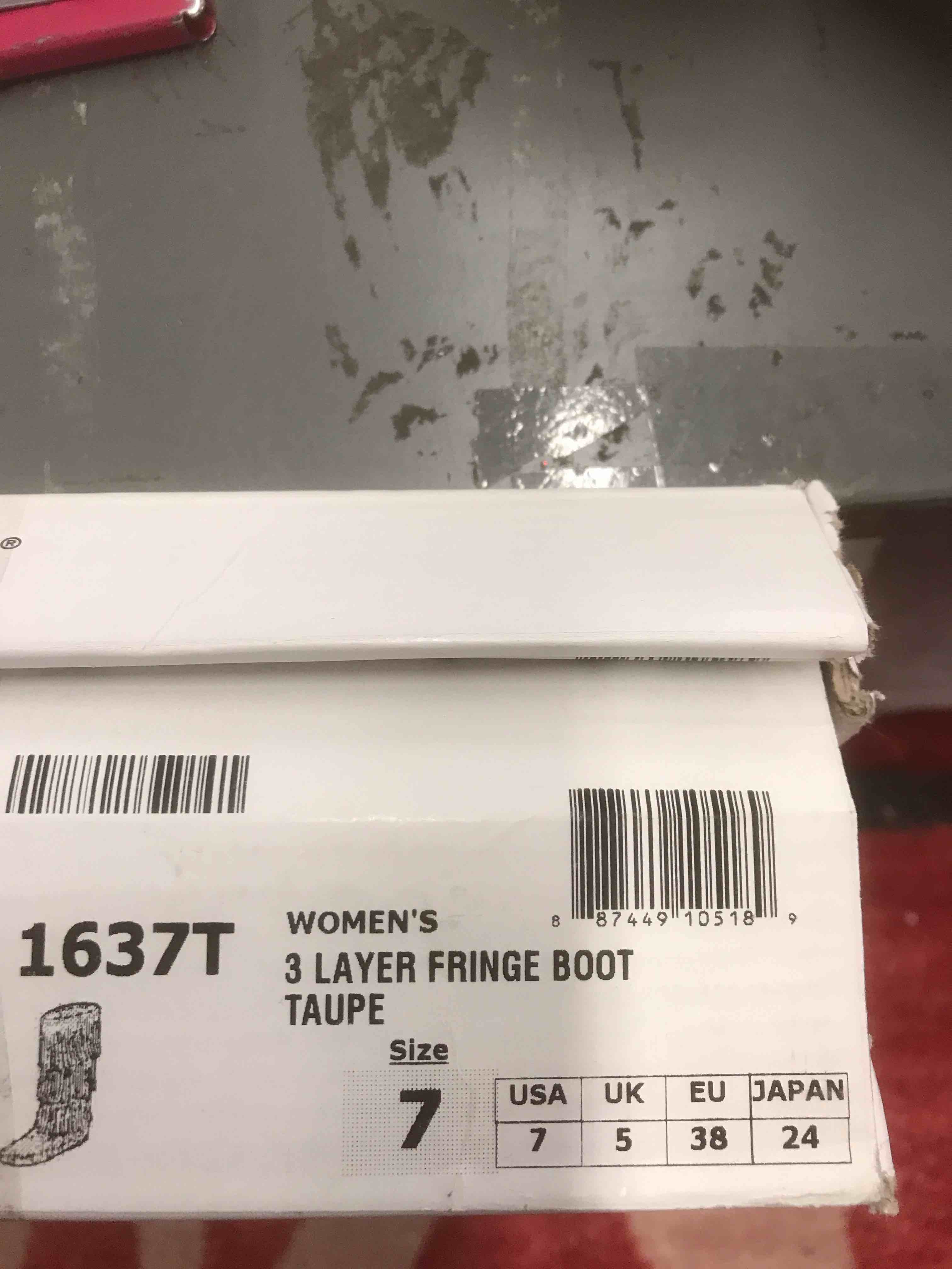 Condition photo showing New/Like New for MinneTonka 3 Layer Fringe Boots Women’s Size 7