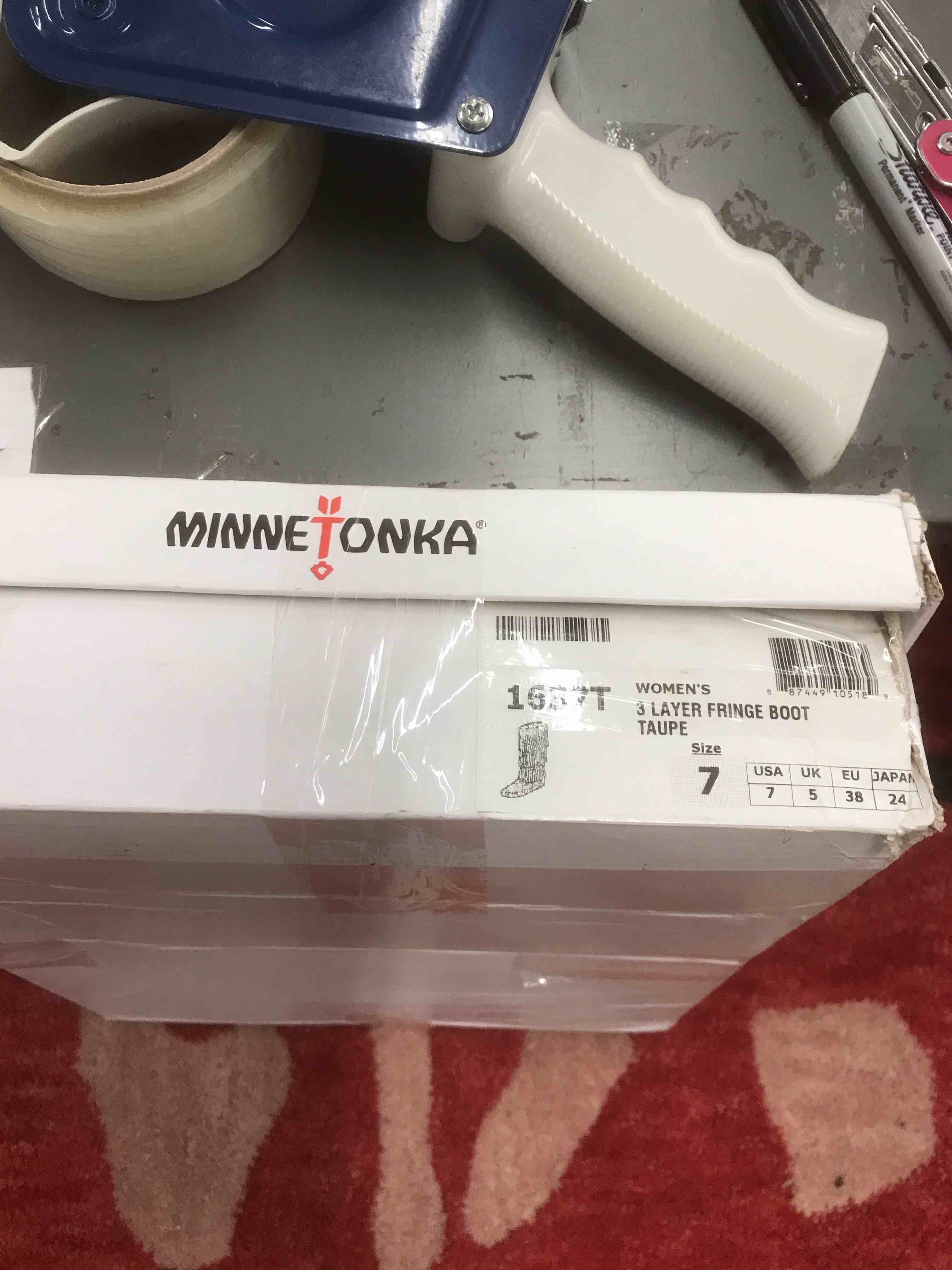 Condition photo showing New/Like New for MinneTonka Women’s Boots.      Size 7