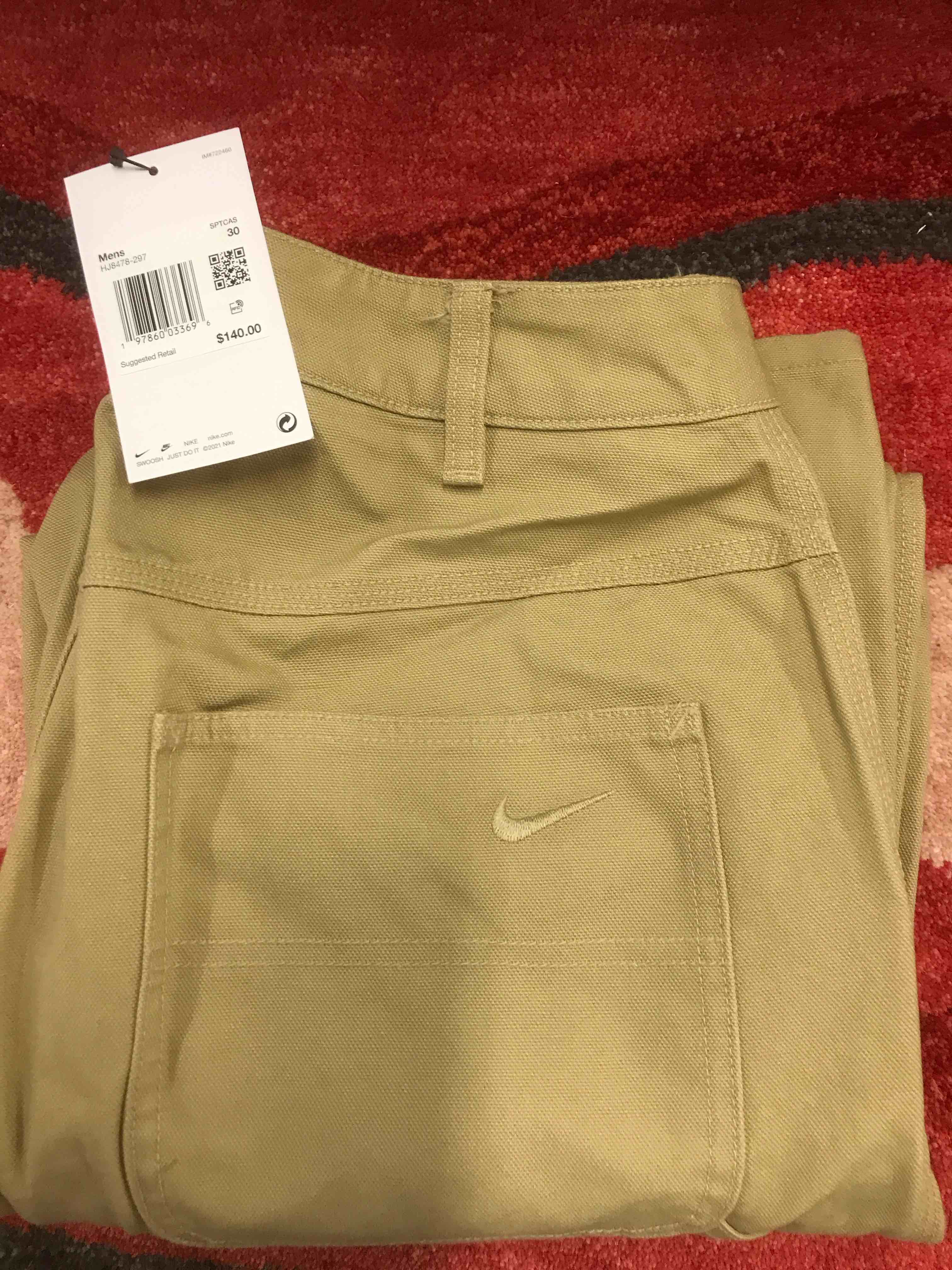 Condition photo showing New/Like New for Nike Life Men's Carpenter Pants (HJ8478-297, Parachute Beige/Desert)