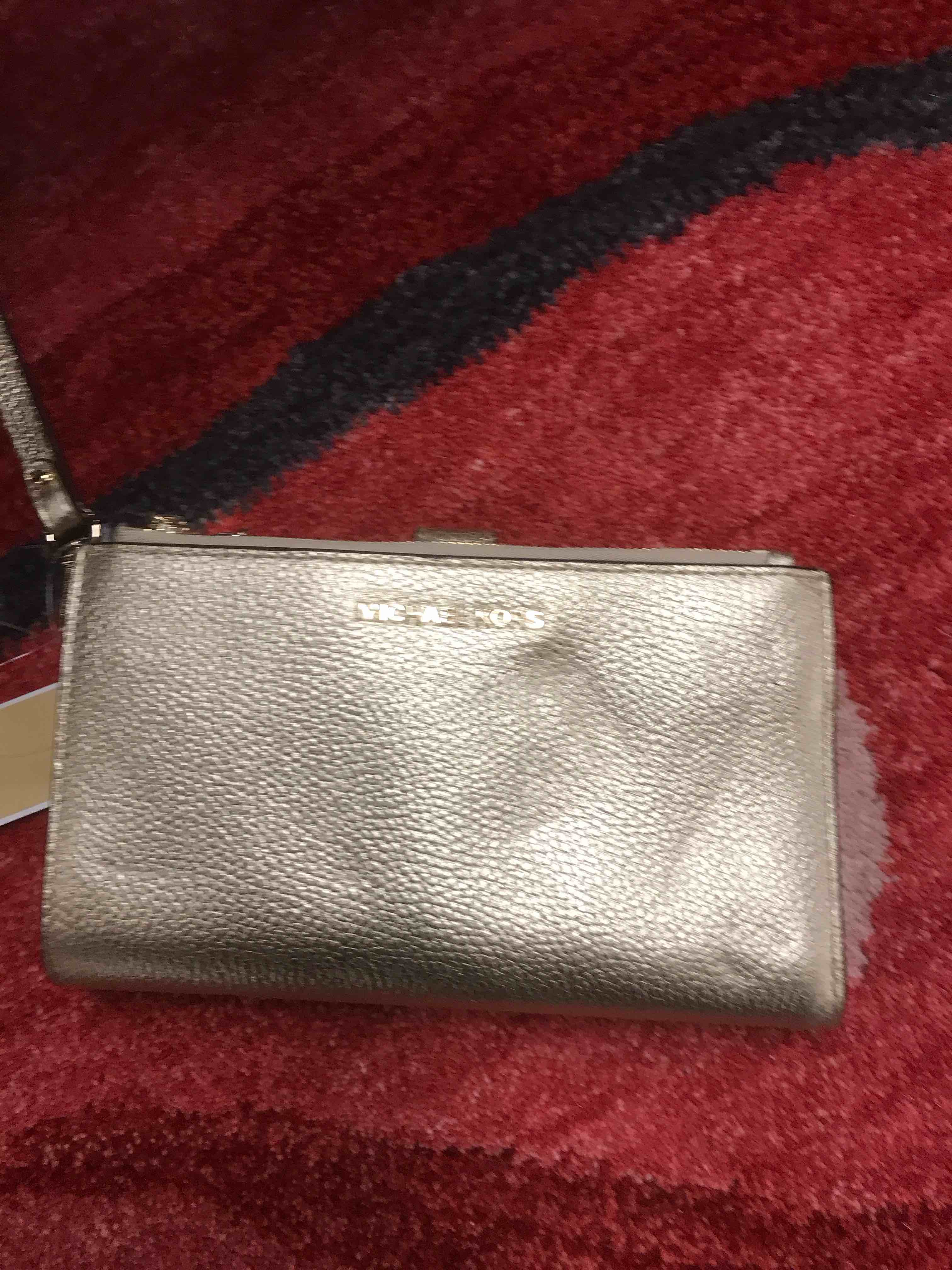 michael kori’s wallet