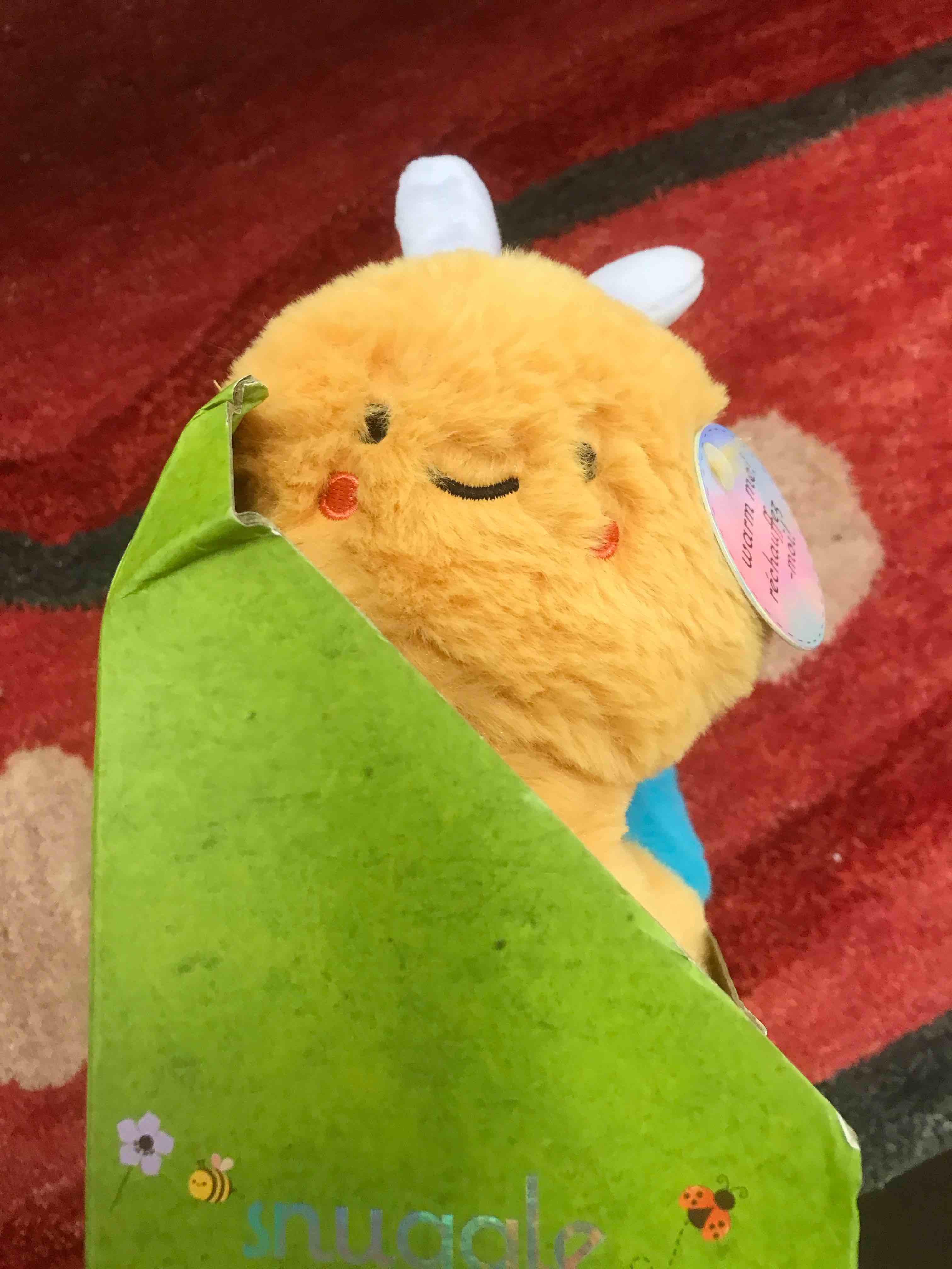 Condition photo showing New/Like New for snuggle buddy heat and hug snail