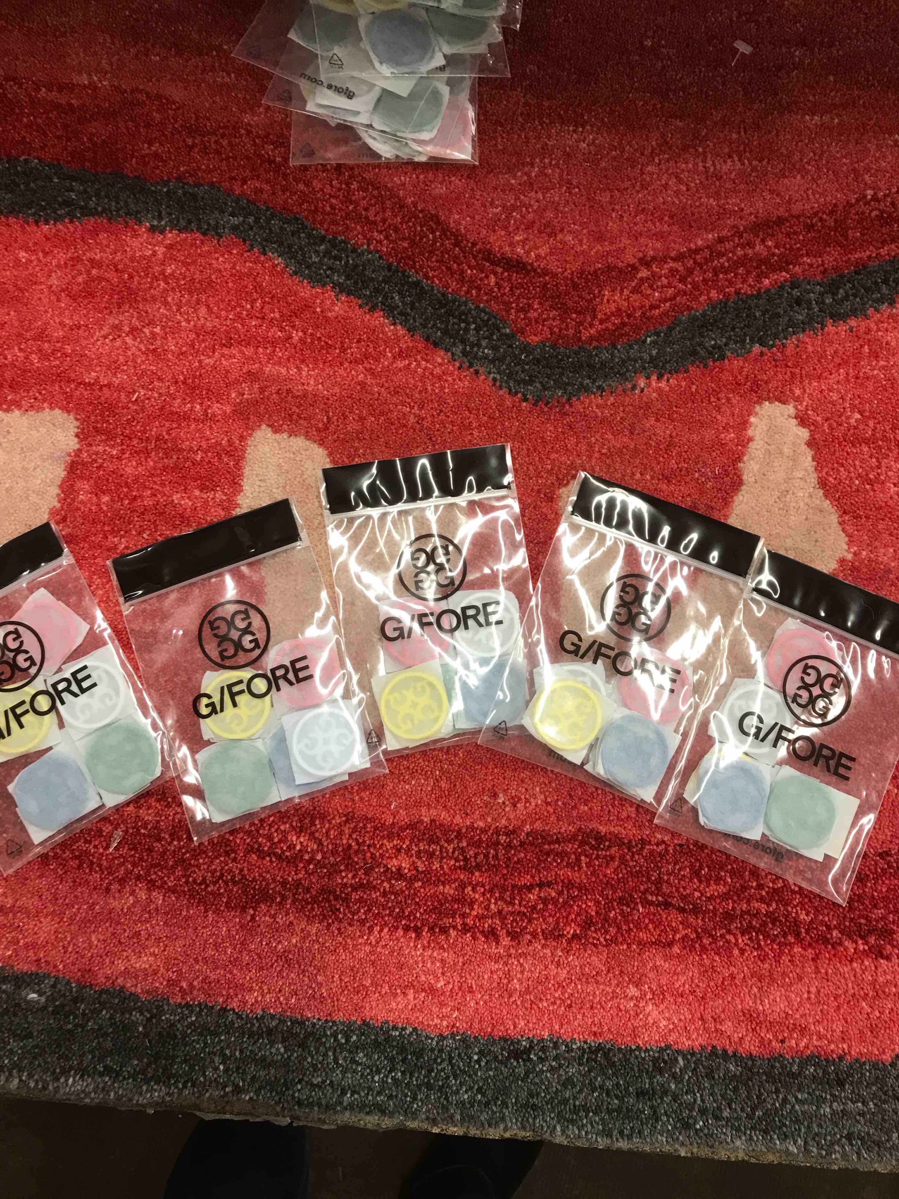 G/Fore Golf Ball Markers.     5 sets of 5