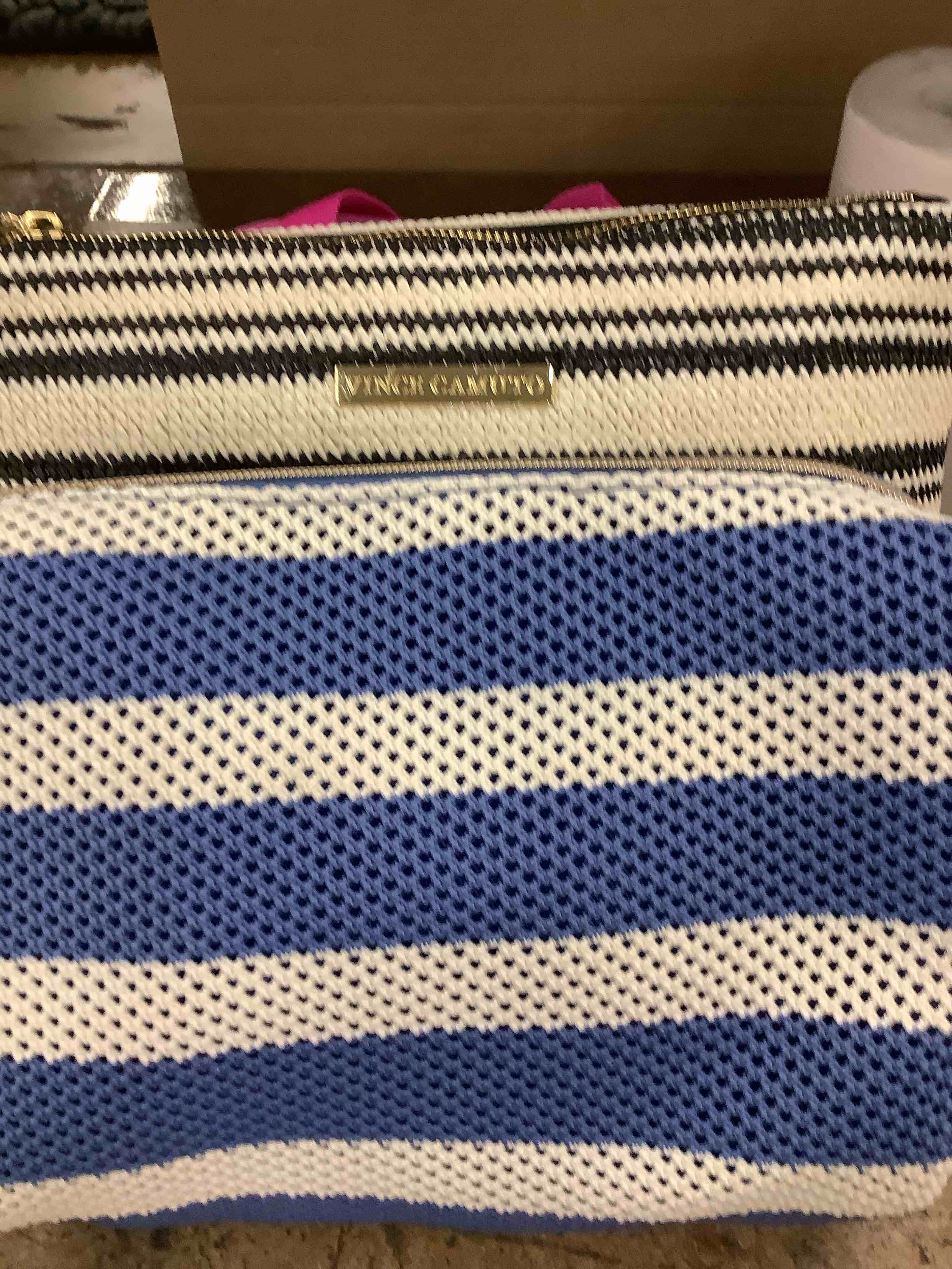 2 make up bag black and white one blue whit stripes 