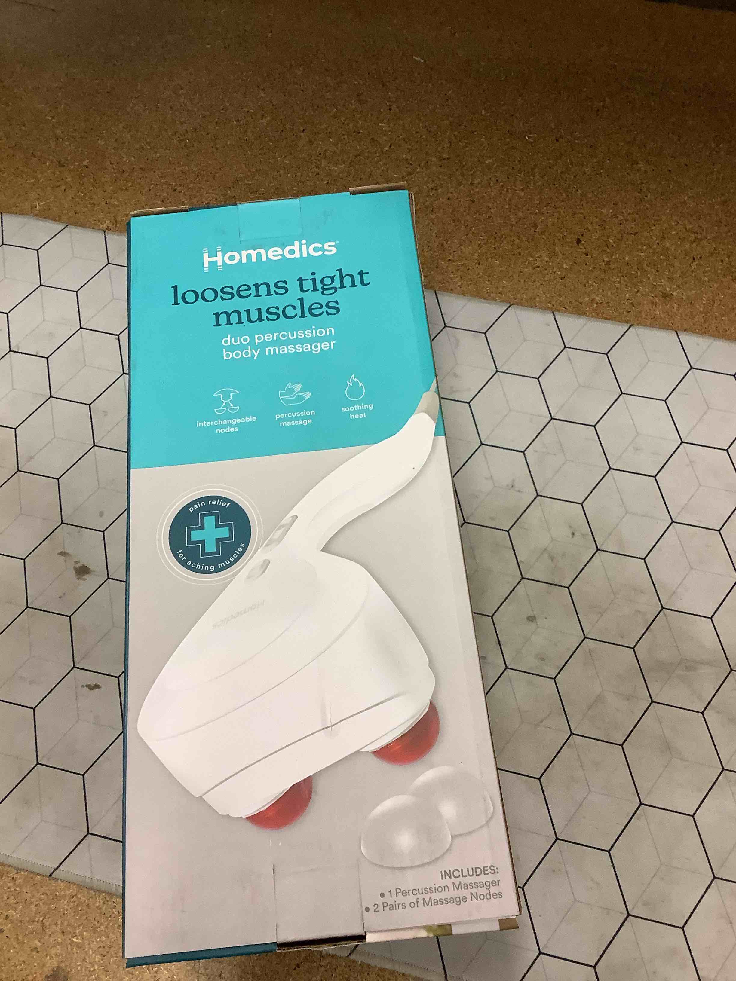 Condition photo showing New/Like New for body massager