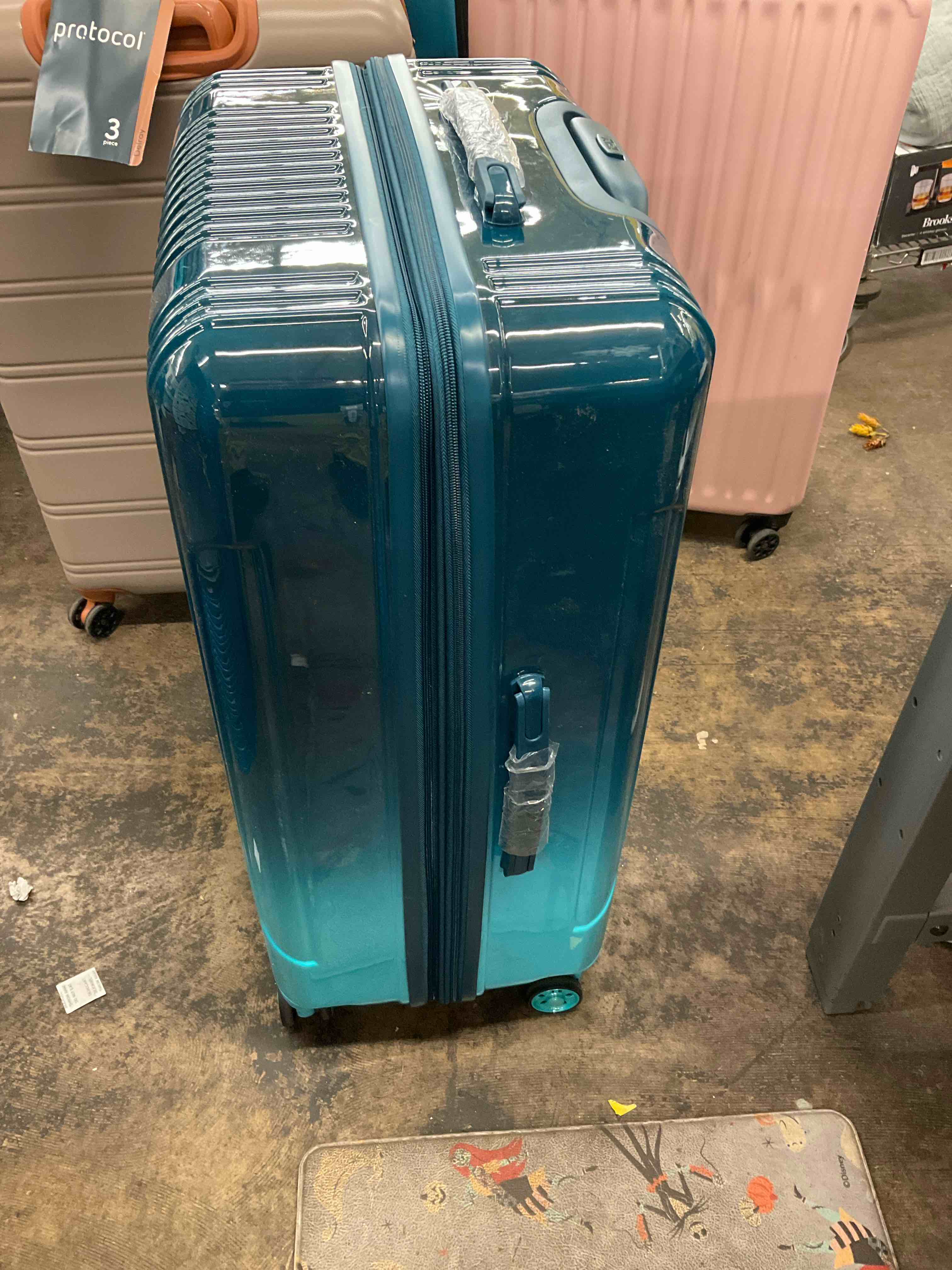 Condition photo showing As Is for suitcase 