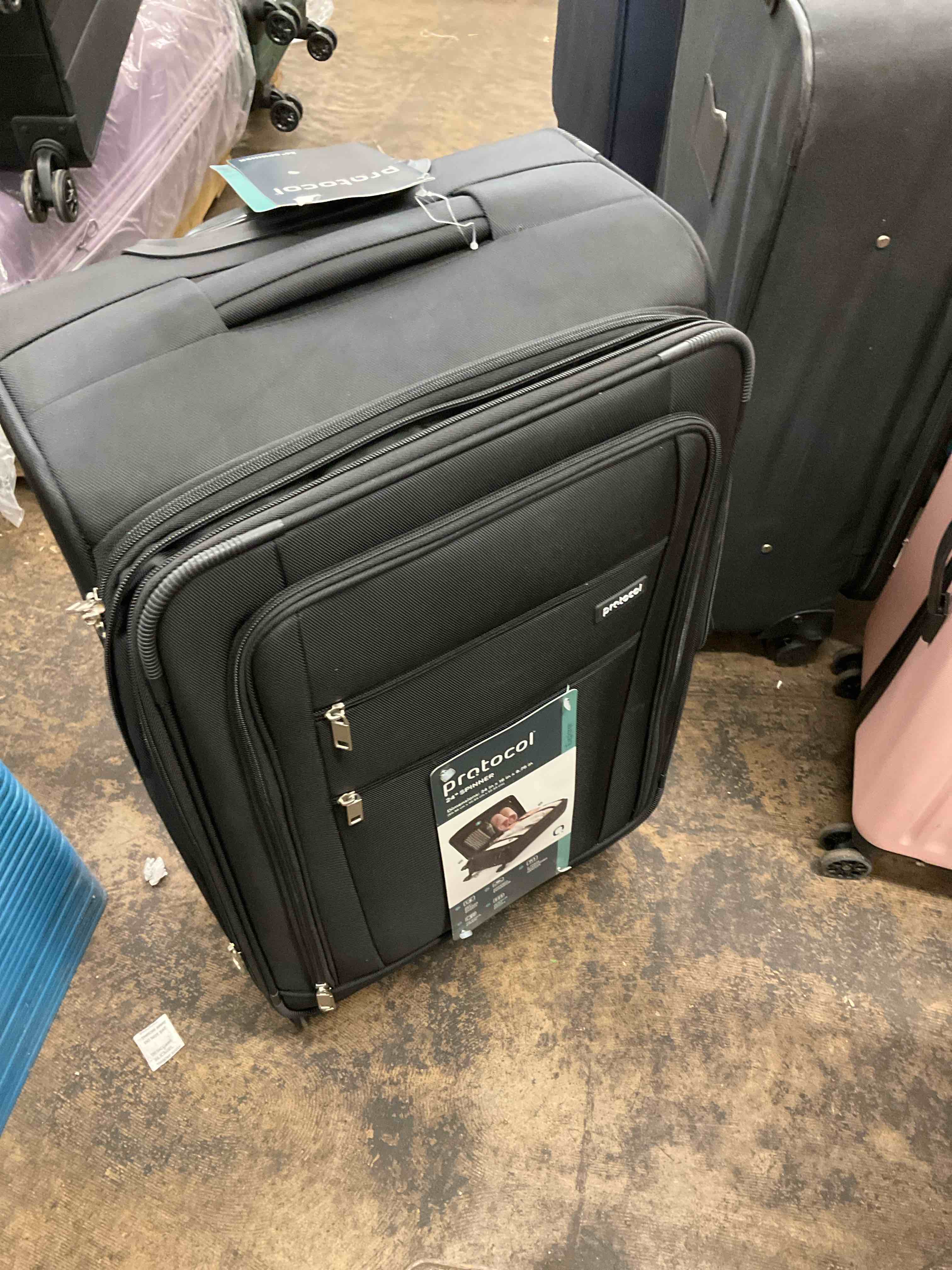 Condition photo showing As Is for suitcase 
