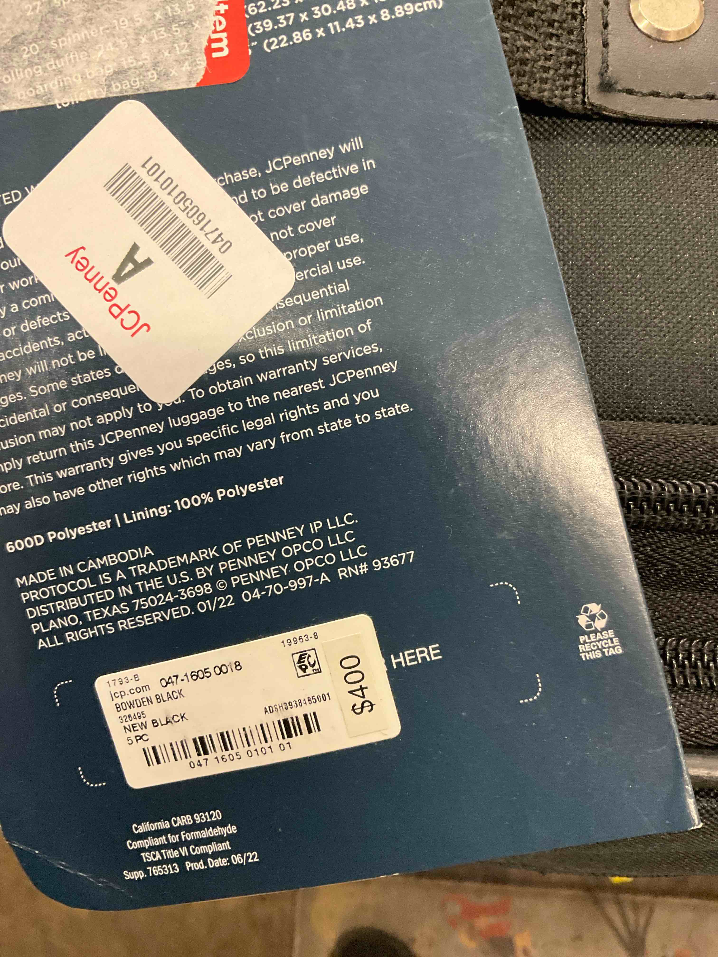 Condition photo showing As Is for suitcase 