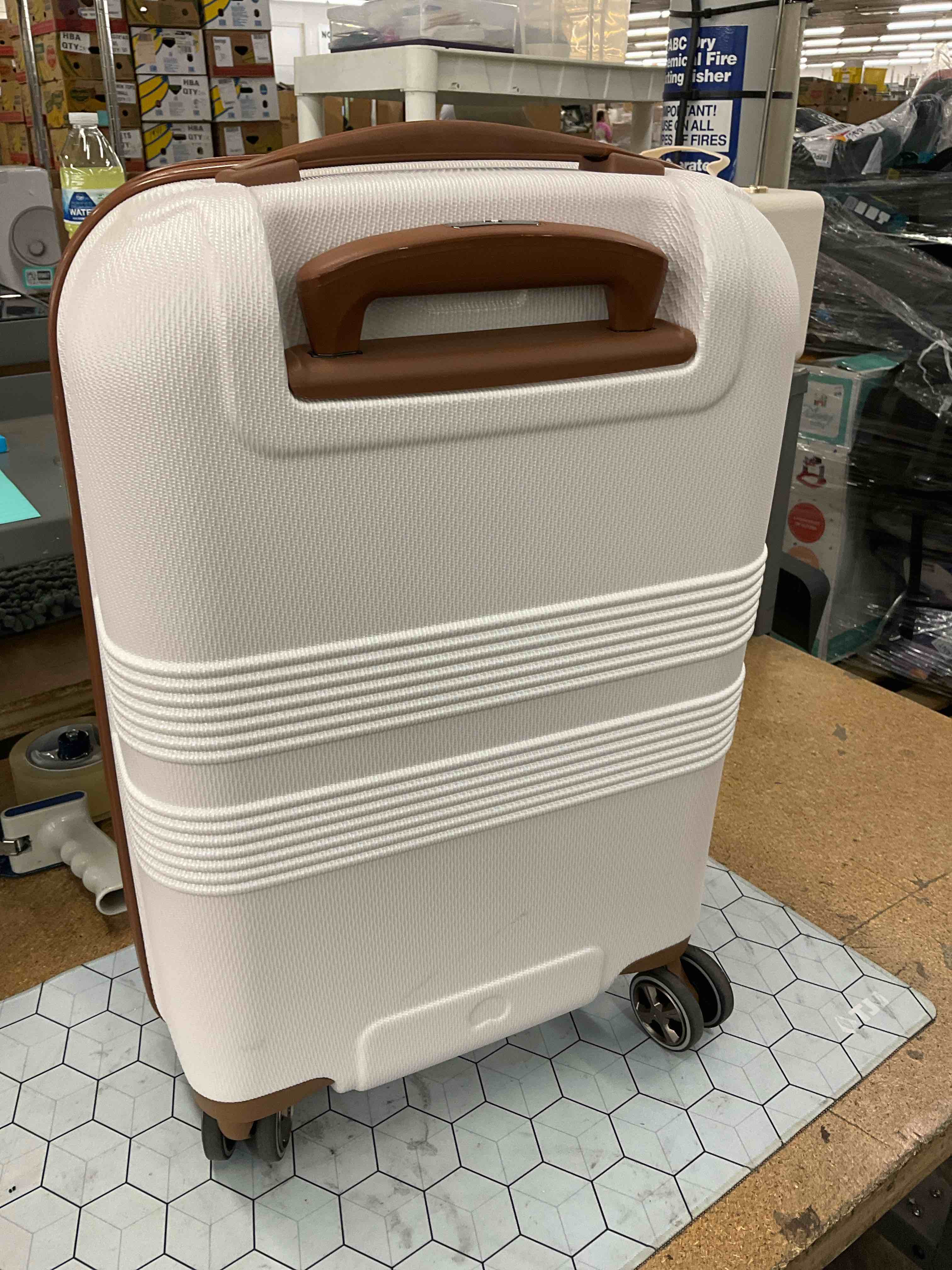 Condition photo showing As Is for suitcase 