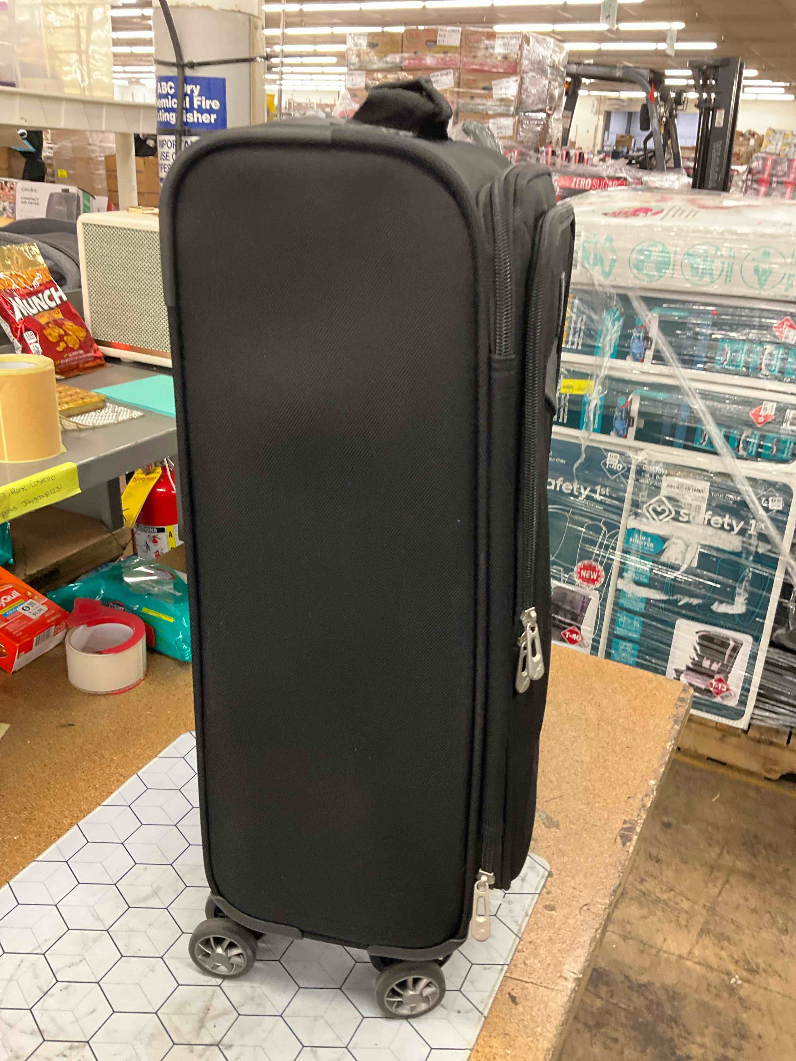 Condition photo showing As Is for suitcase 