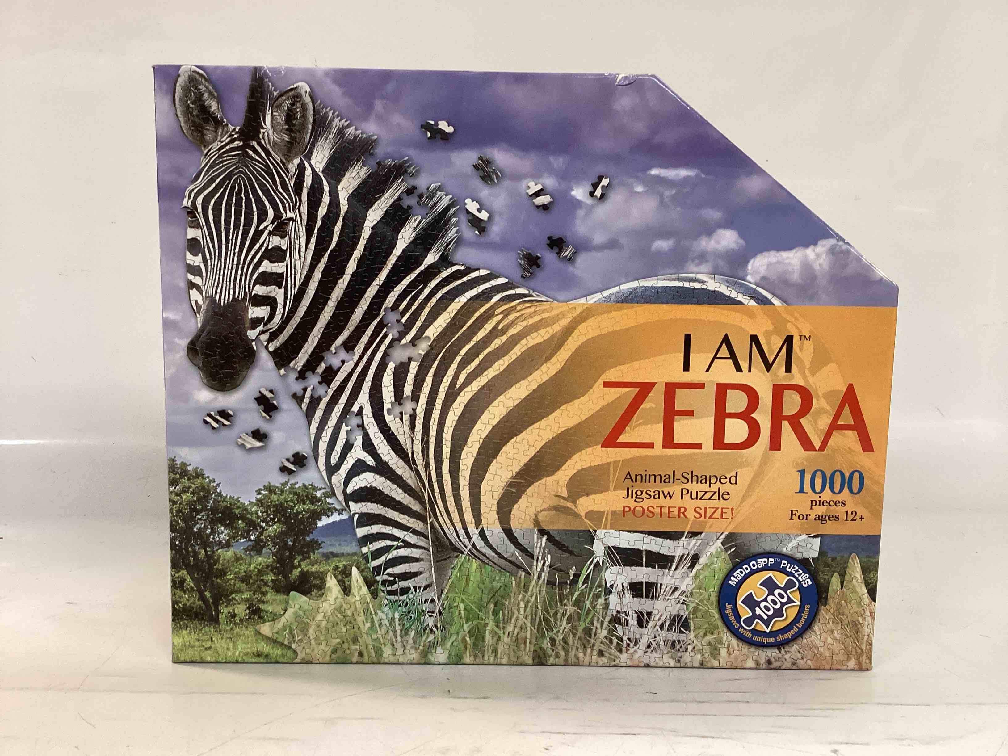 Madd Capp ZEBRA 1000 Piece Jigsaw Puzzle For Ages 12+ – 7003 - Unique-Shaped Border  Poster Size  Challenging Random Cut  Five-Sided Box Fits on Bookshelf  Includes Educational Madd Capp Fun Facts