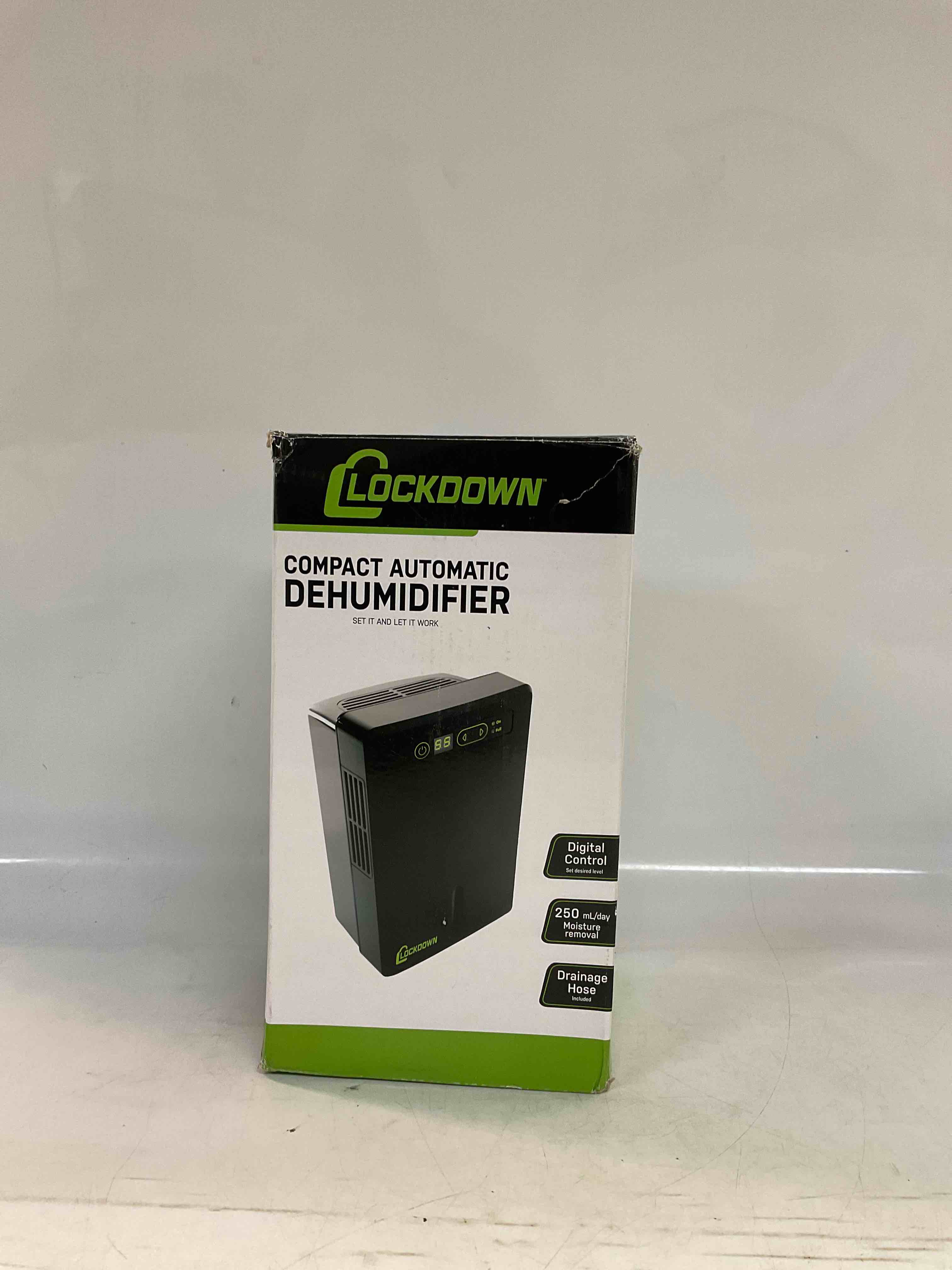 lockdown automatic dehumidifier with quiet operation, drain hose and self monitoring controls for humidity control in small rooms, safes and closets