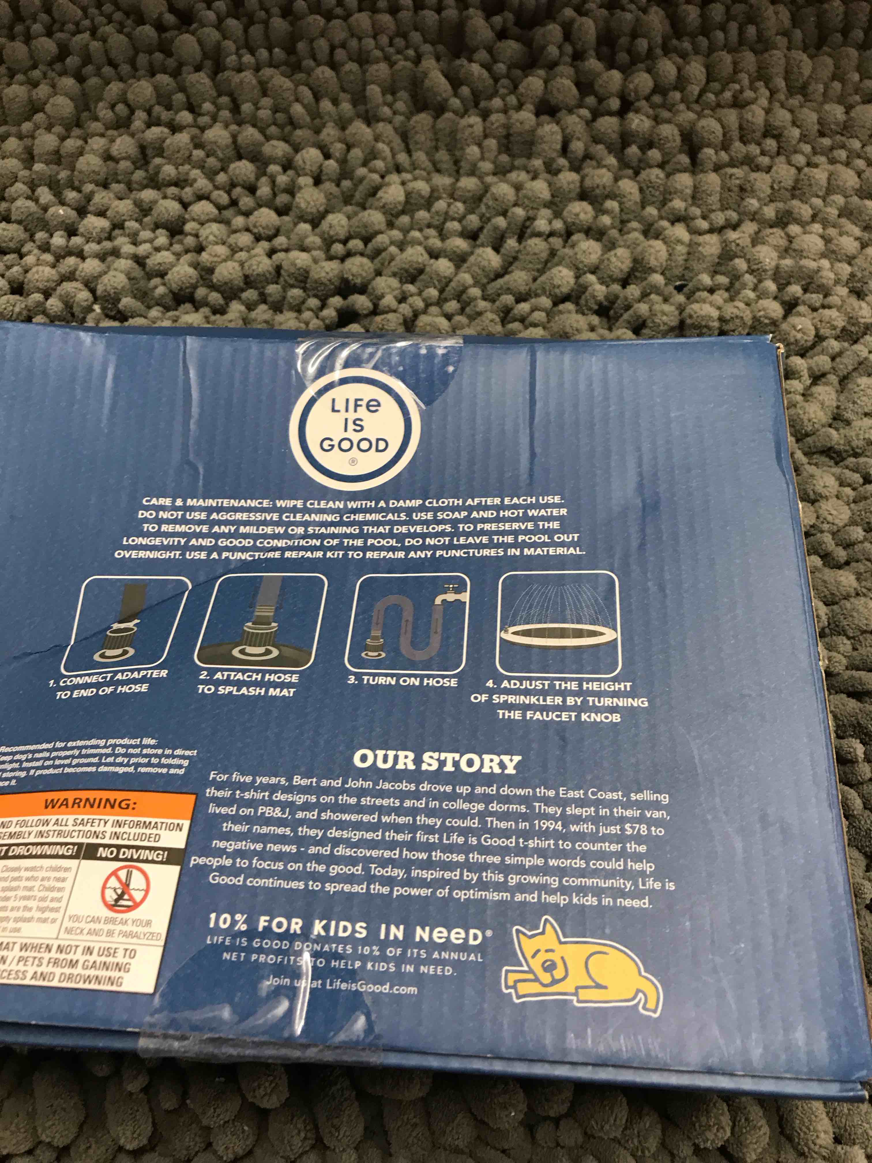 Condition photo showing New/Like New for sprinkler splash mat