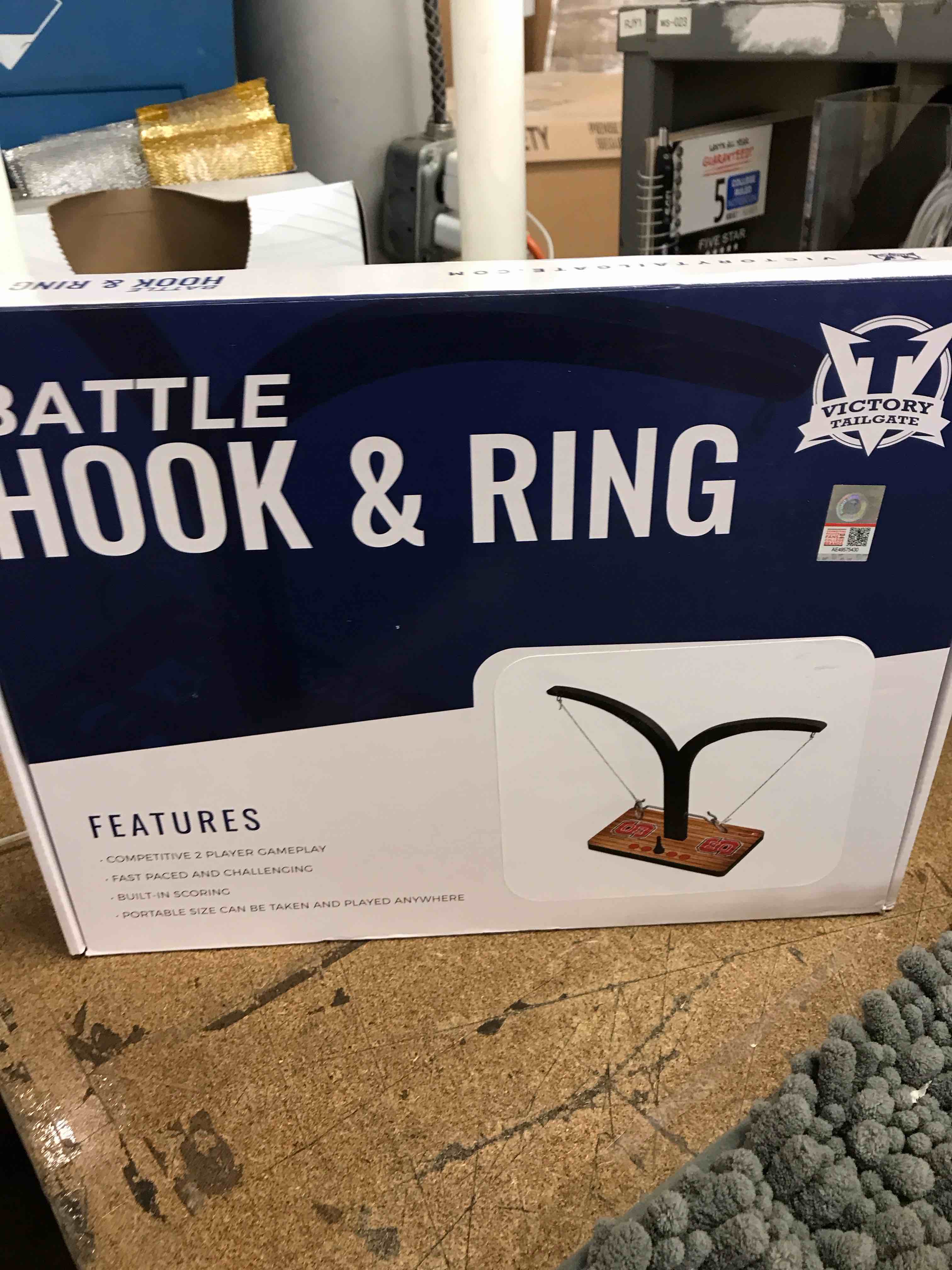 Condition photo showing New/Like New for battle hook & ring game