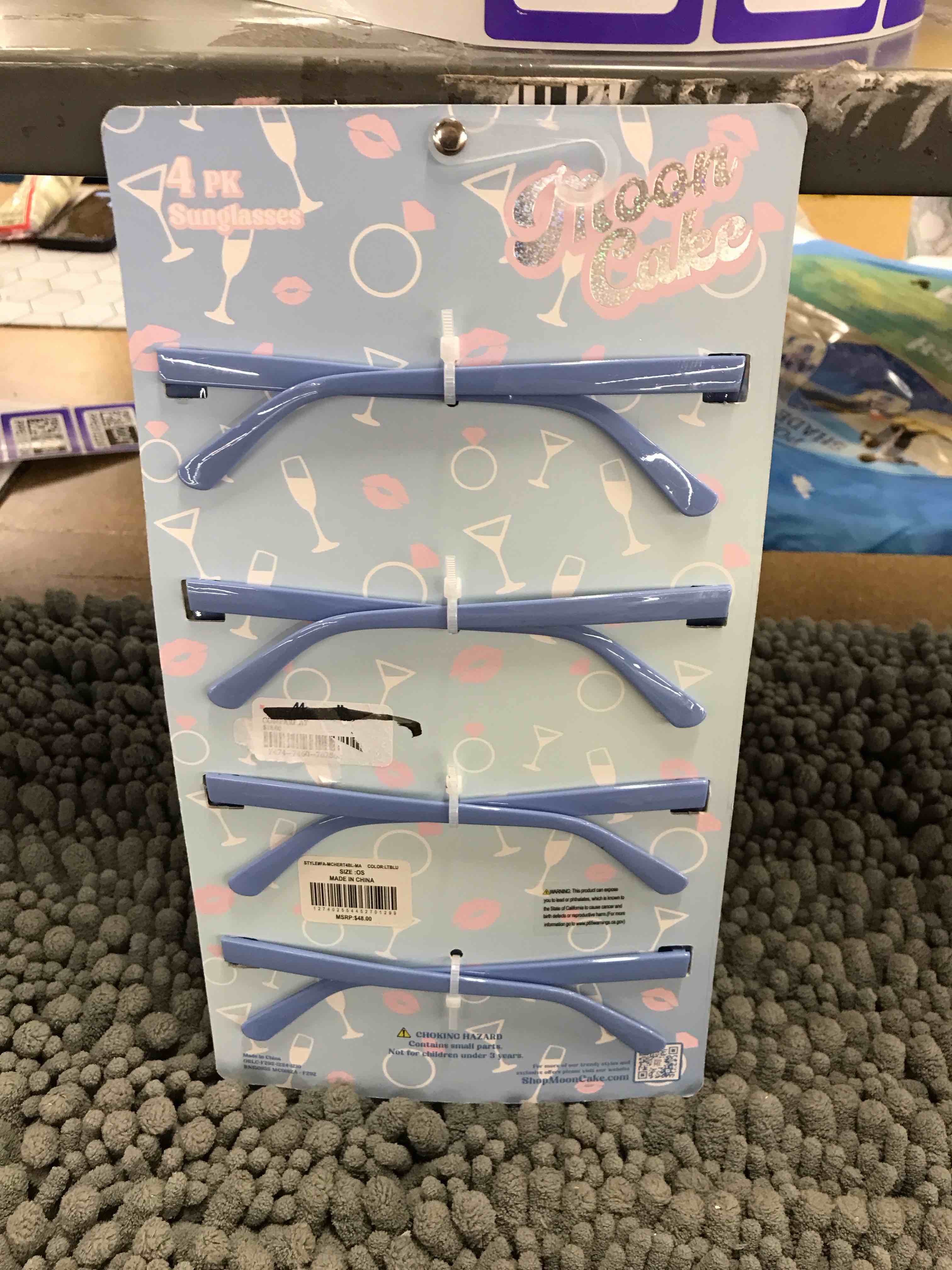 Condition photo showing New/Like New for 4 pack sunglasses