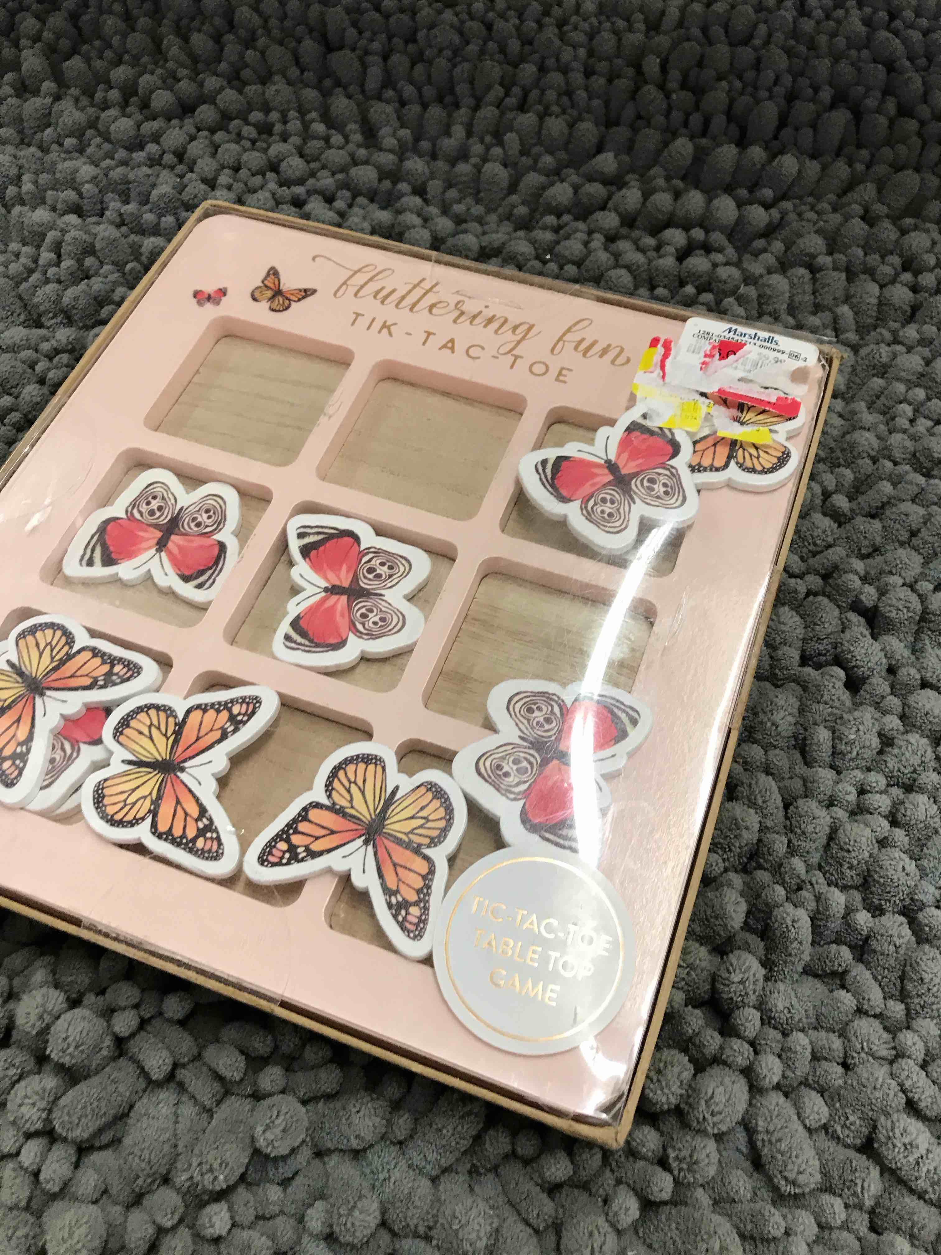 Condition photo showing New/Like New for butterfly tik-tac-toe board