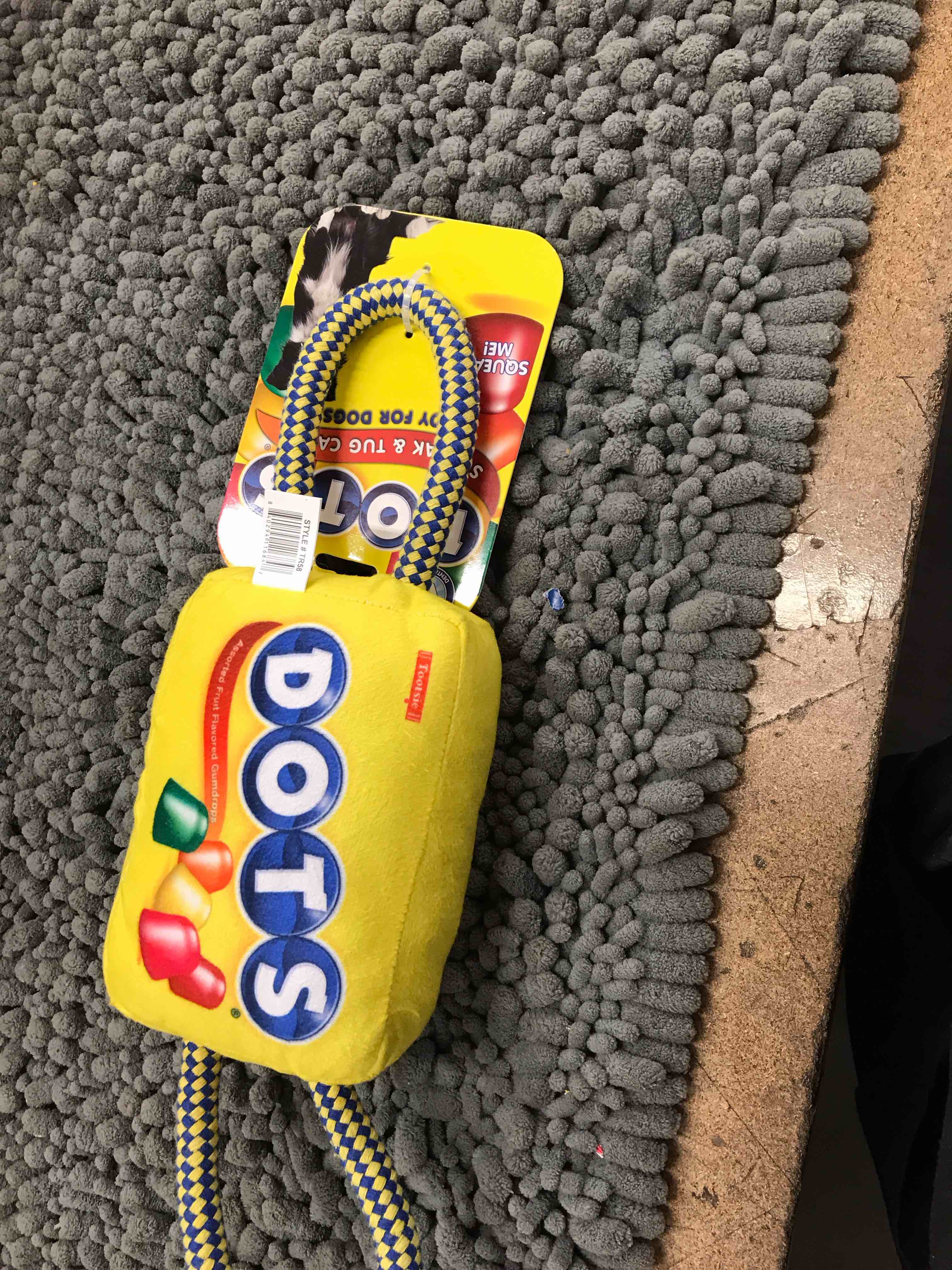 Condition photo showing New/Like New for dots squeak & tug toy