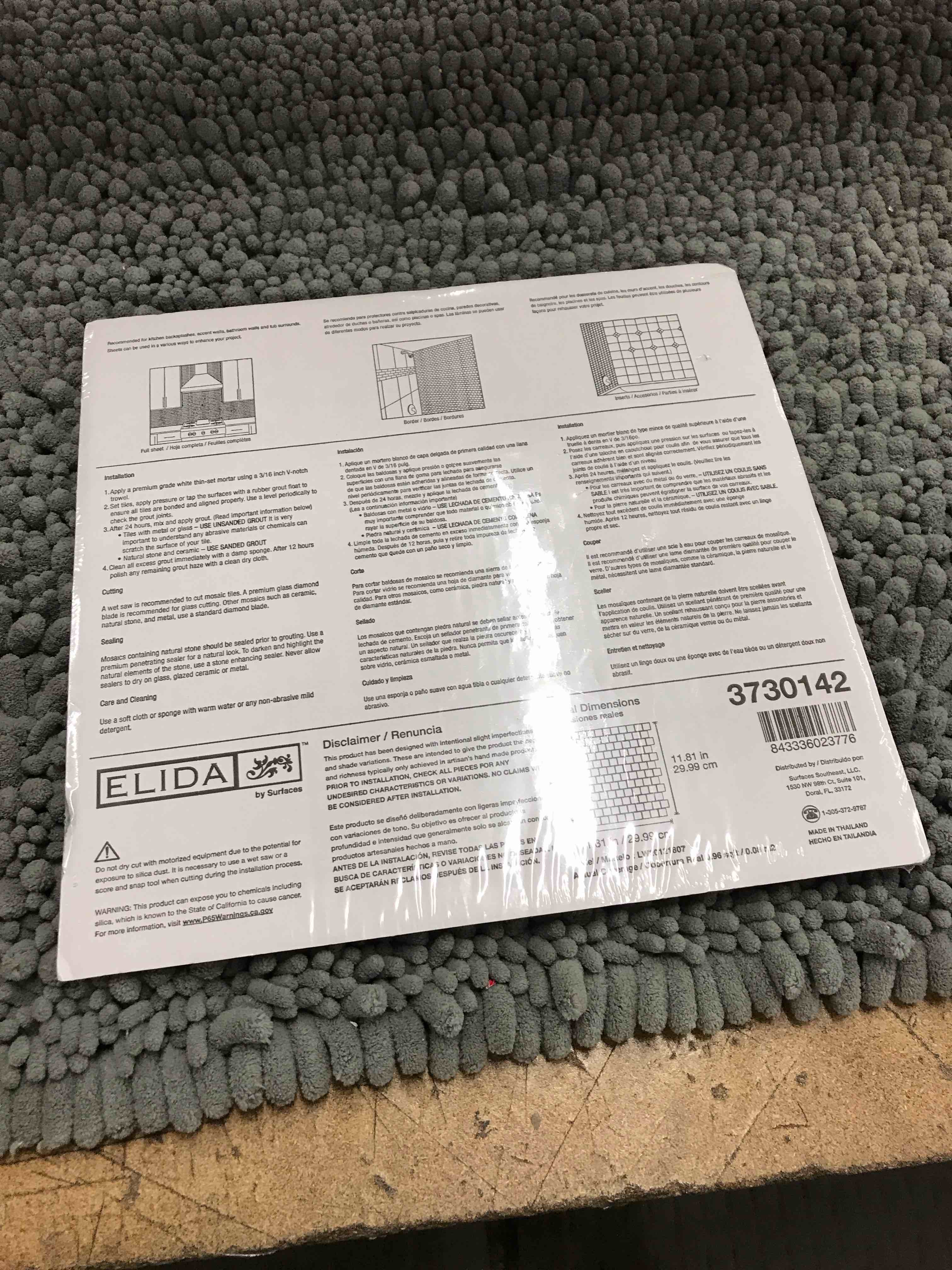 Condition photo showing New/Like New for tiles