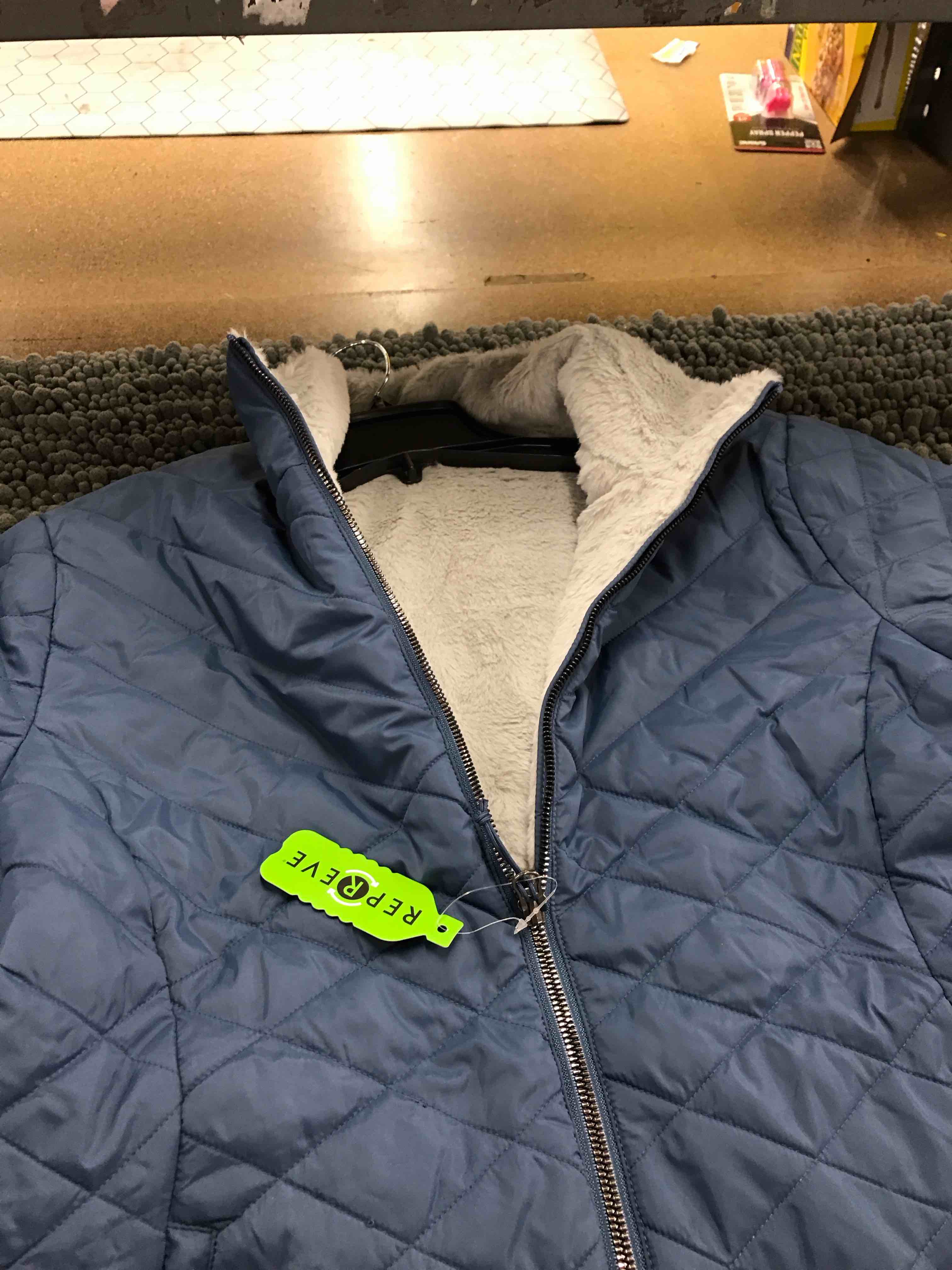 Condition photo showing New/Like New for free country reversible jacket