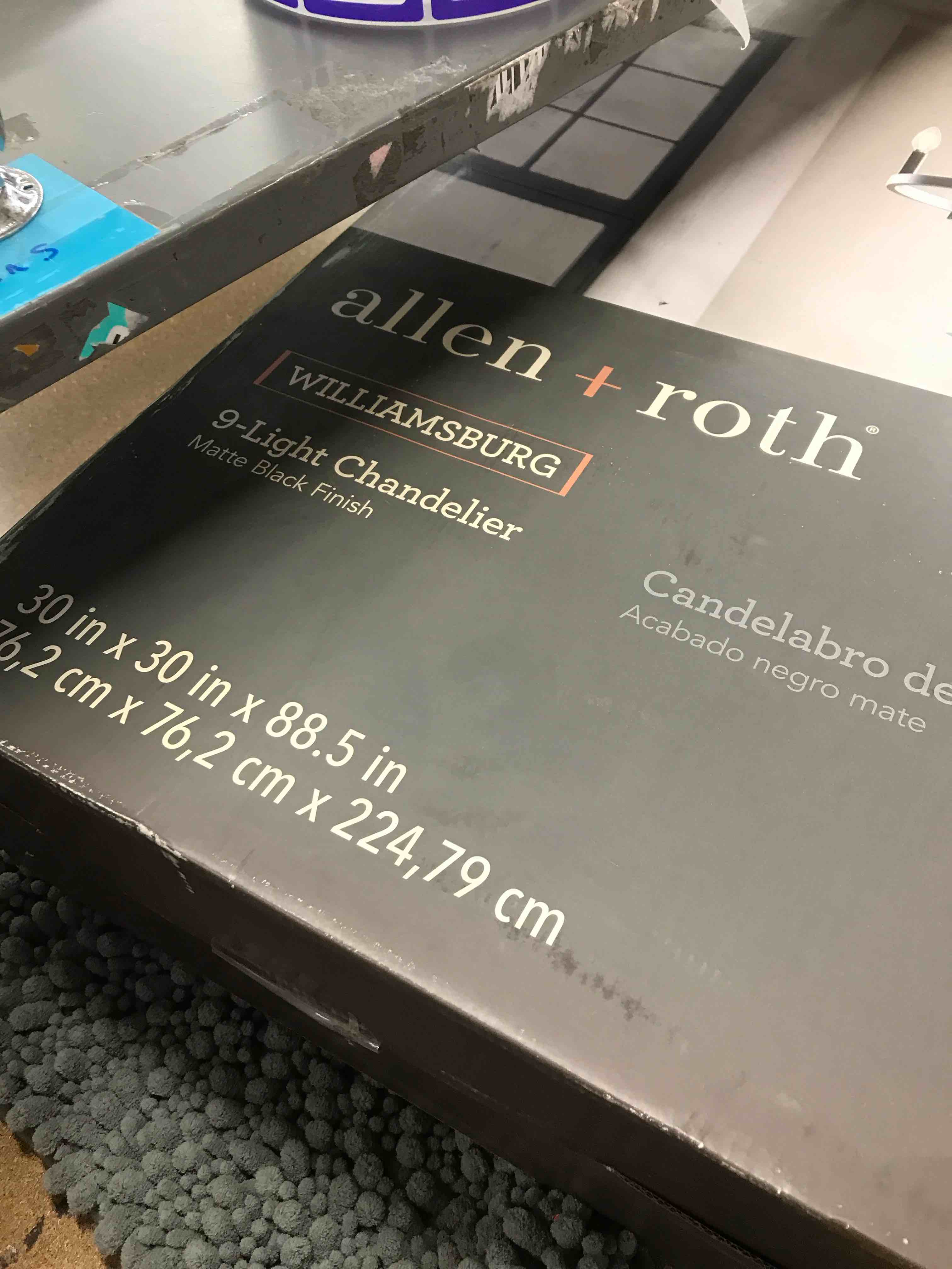 Condition photo showing New/Like New for 9 light chandelier