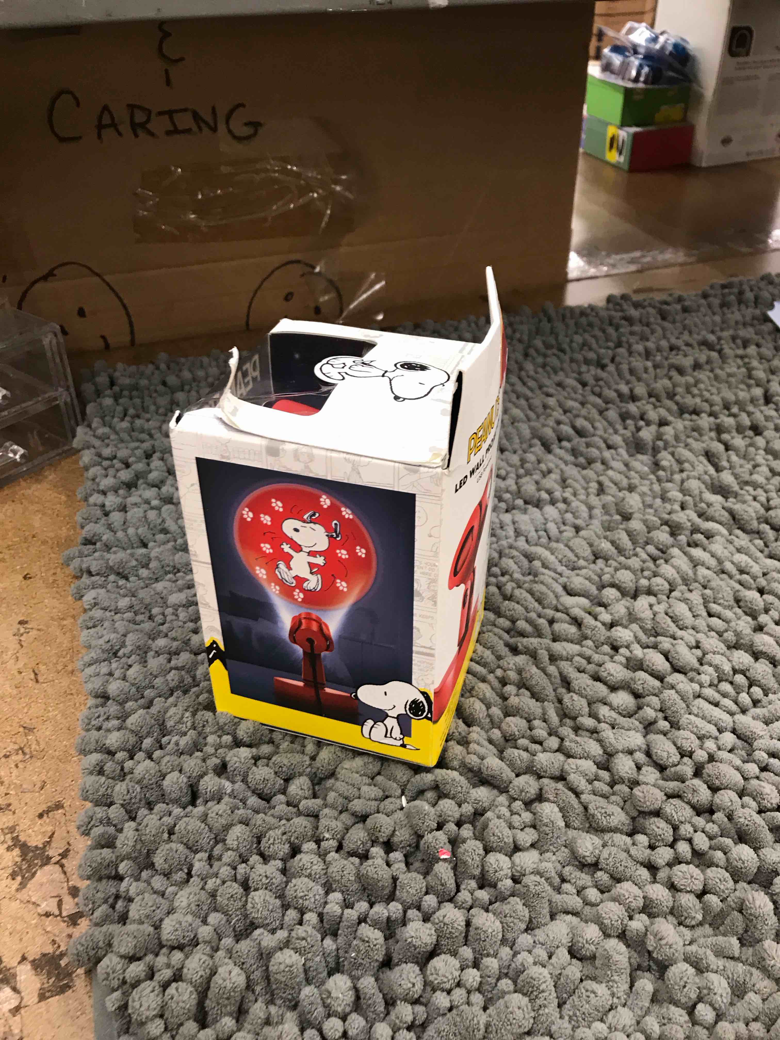 Condition photo showing New/Like New for peanuts led wall projector