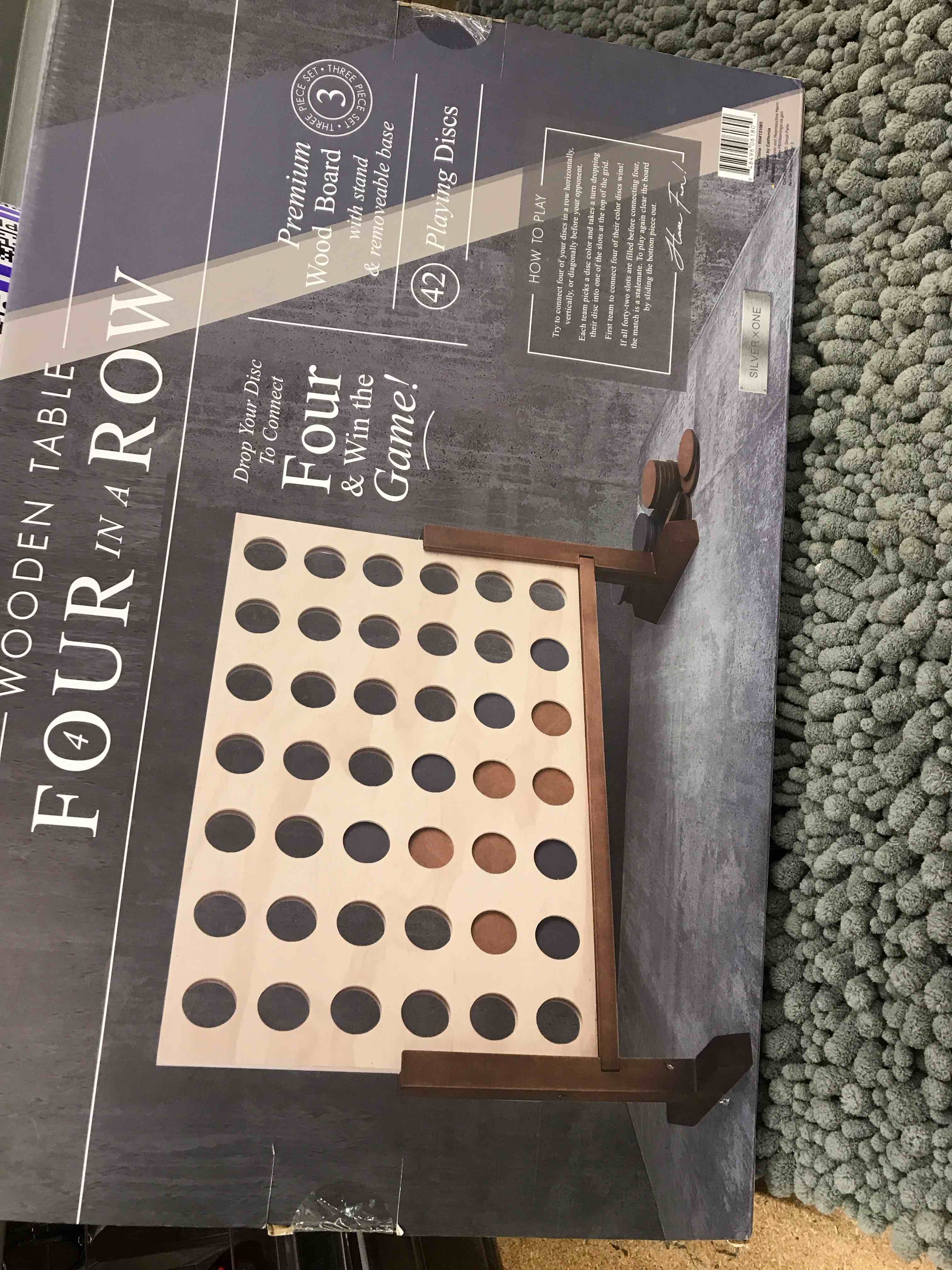 Condition photo showing New/Like New for wooden table four in a row game