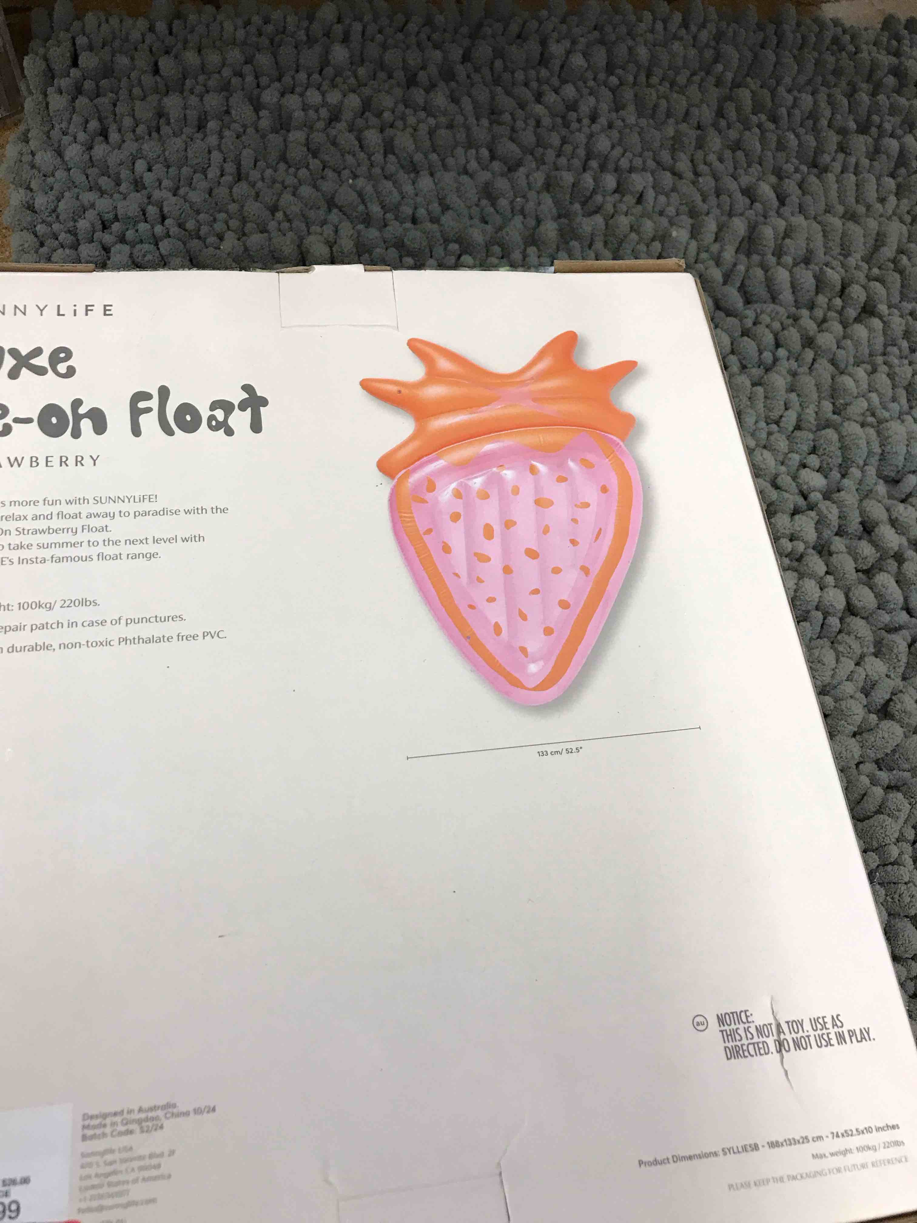 Condition photo showing New/Like New for strawberry shaped floatie