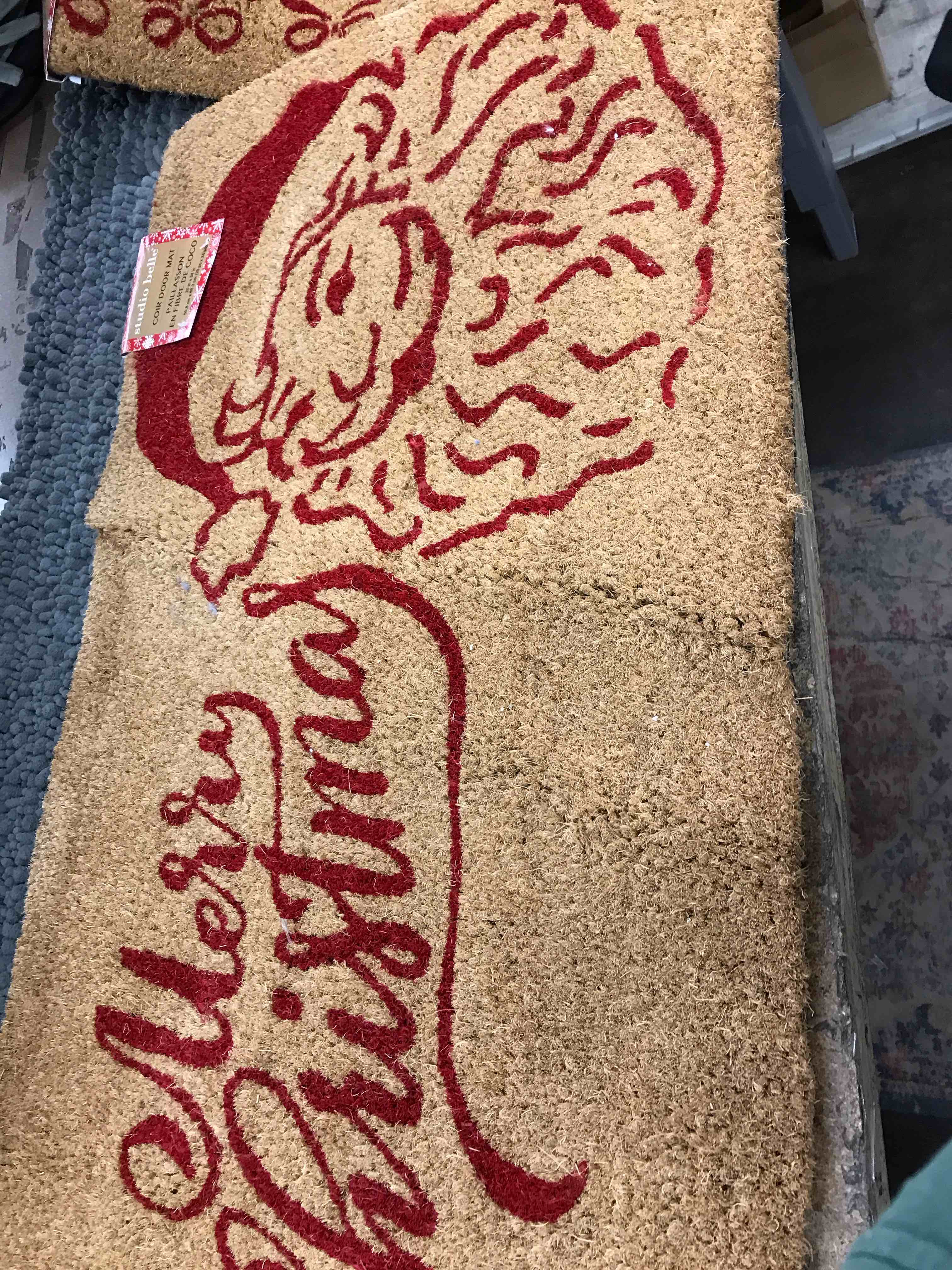Condition photo showing New/Like New for door mat