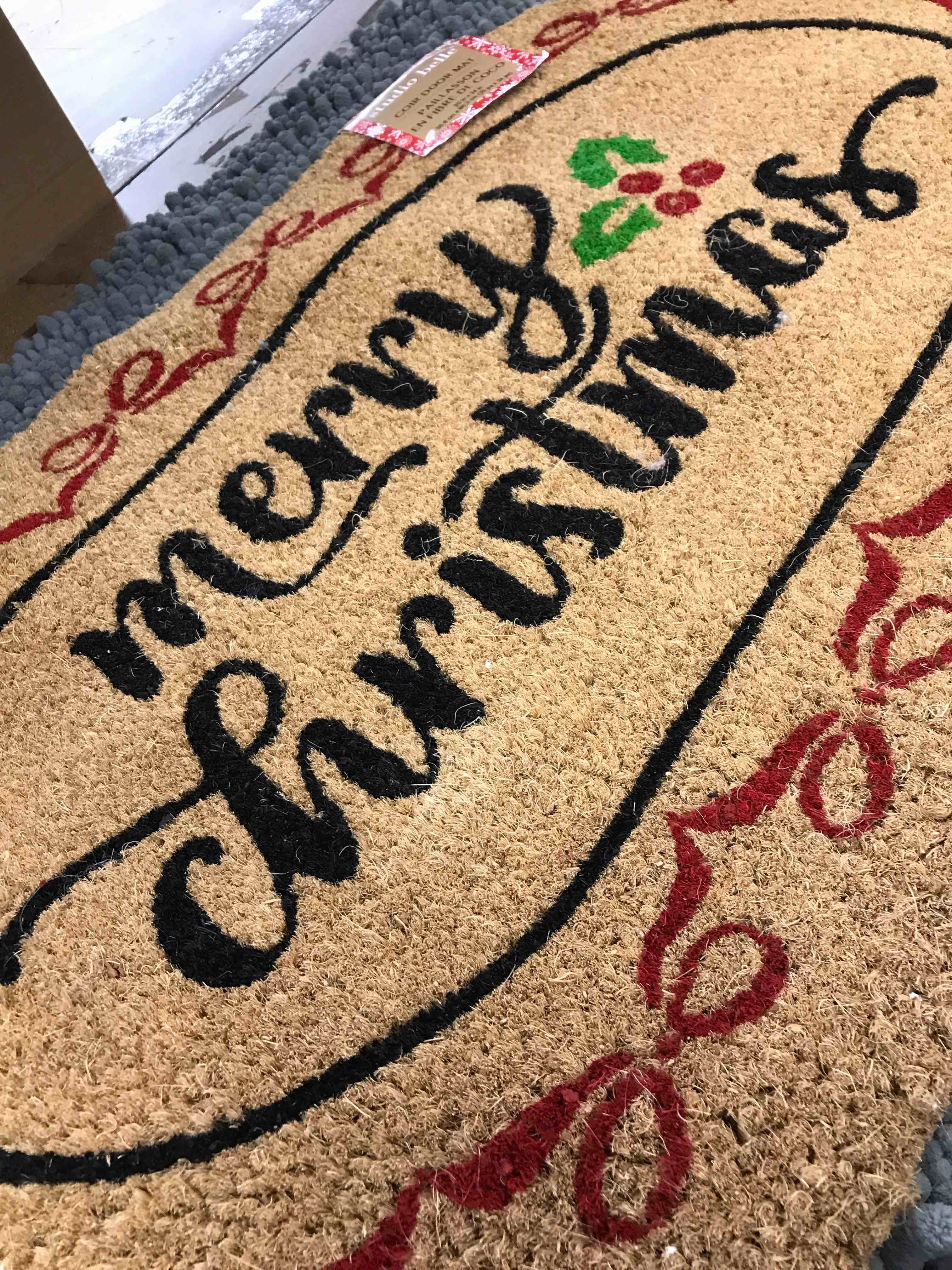 Condition photo showing New/Like New for door mat