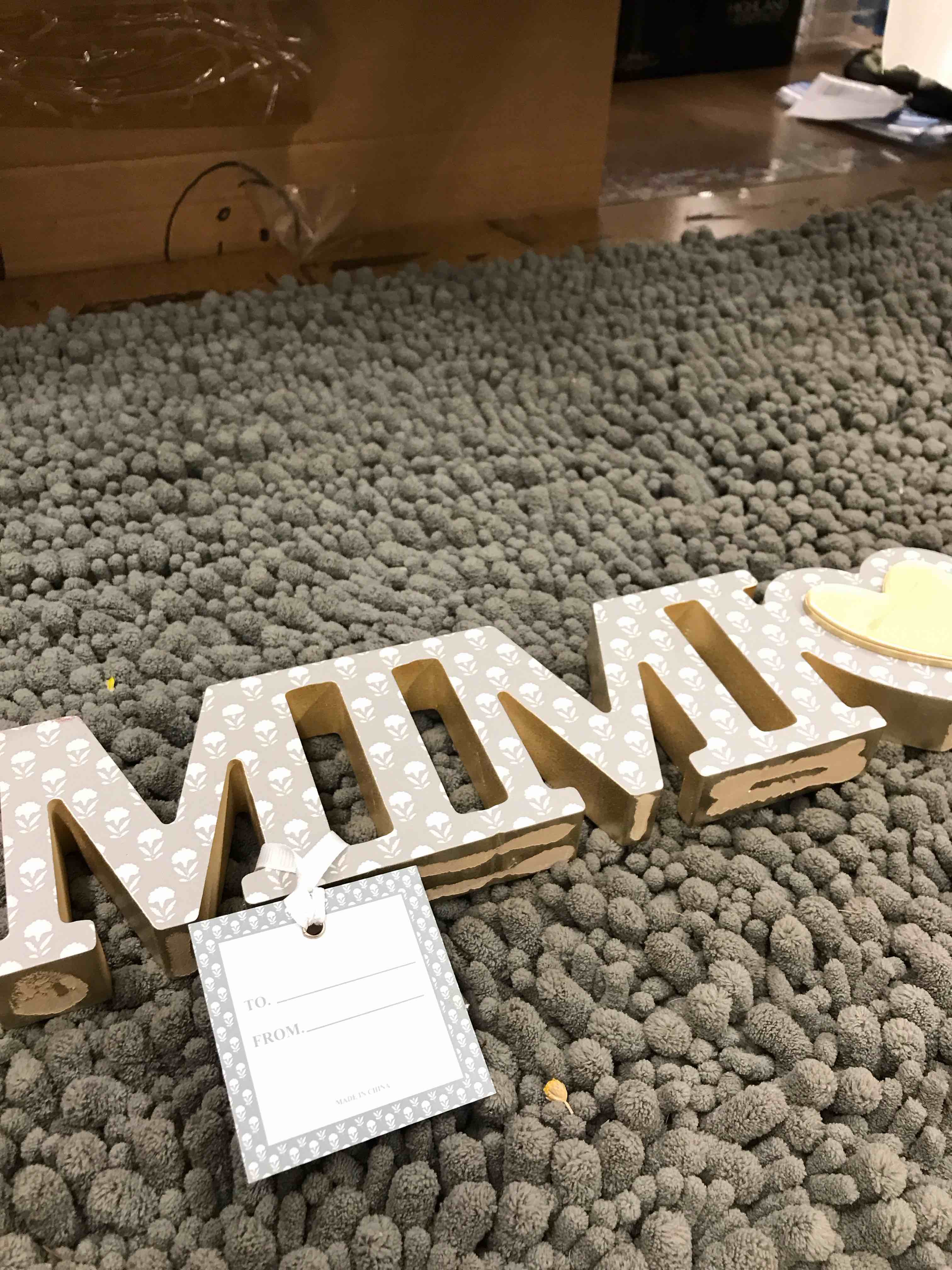 Condition photo showing New/Like New for decorative plaque 