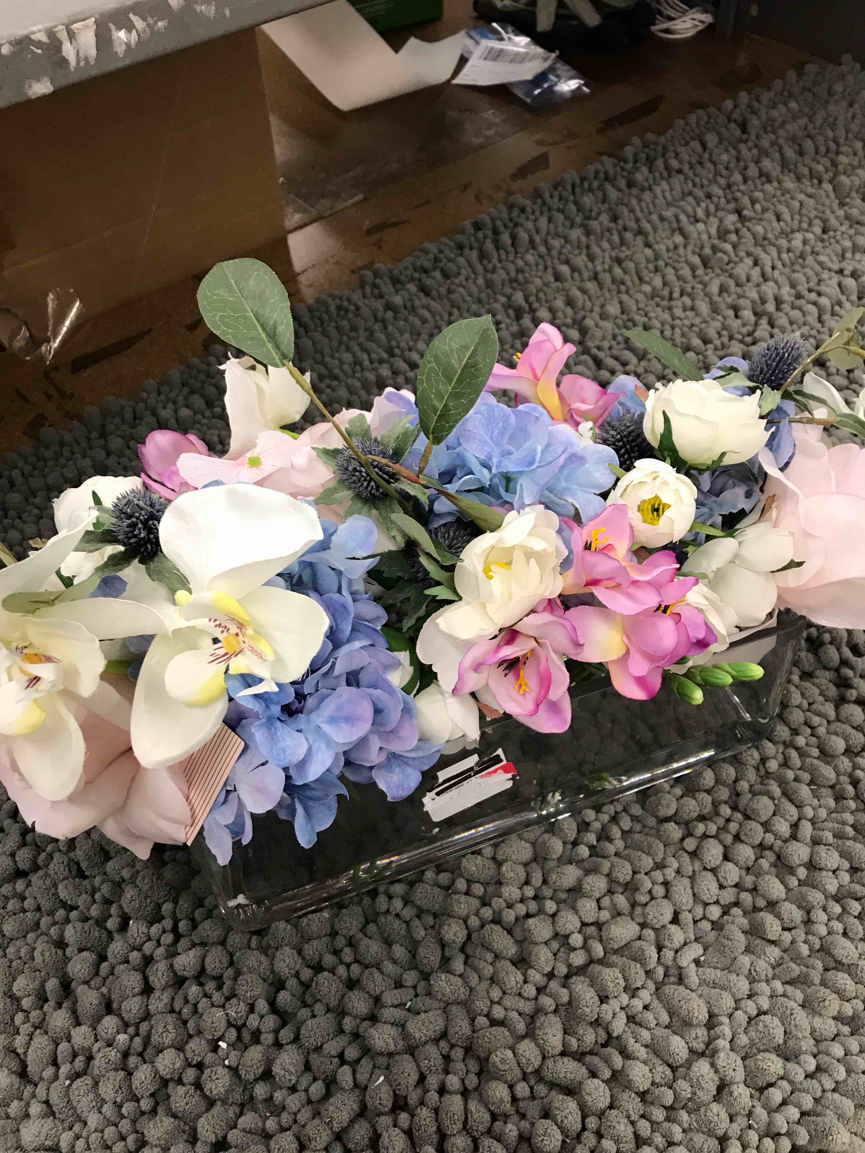 Condition photo showing New/Like New for decorative flowers in glass vase