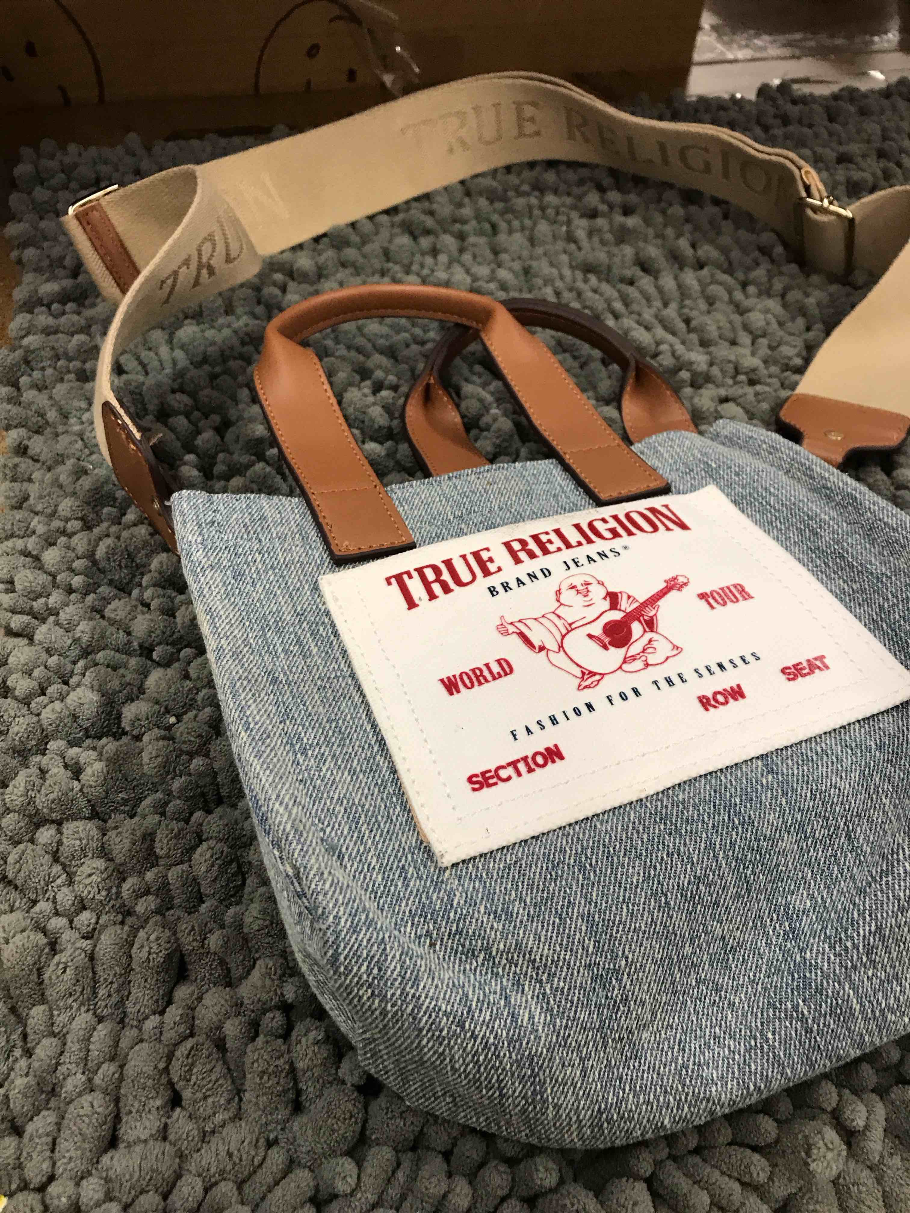 Condition photo showing New/Like New for true religion brand jeans purse