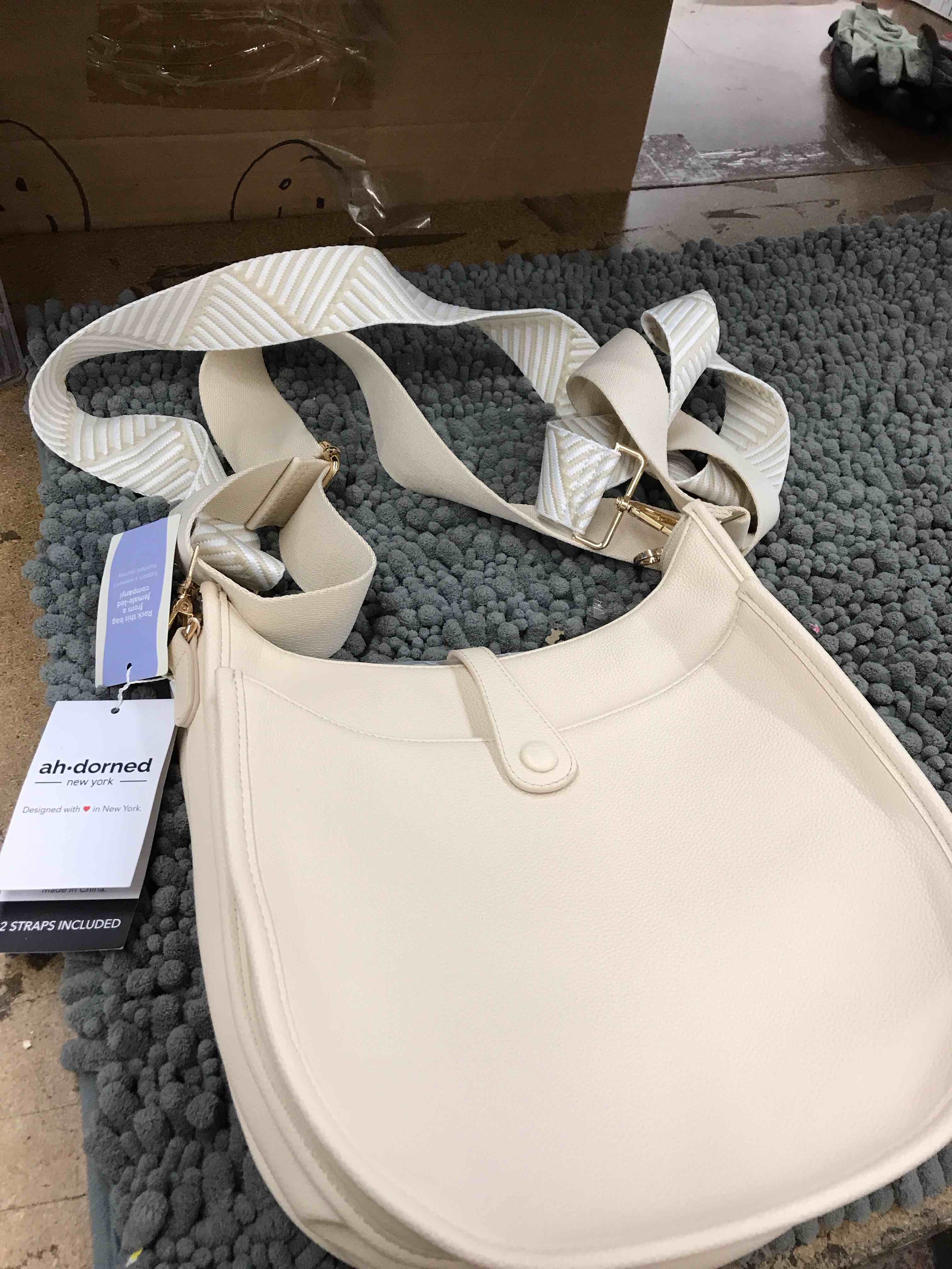 ah-dorned New York purse