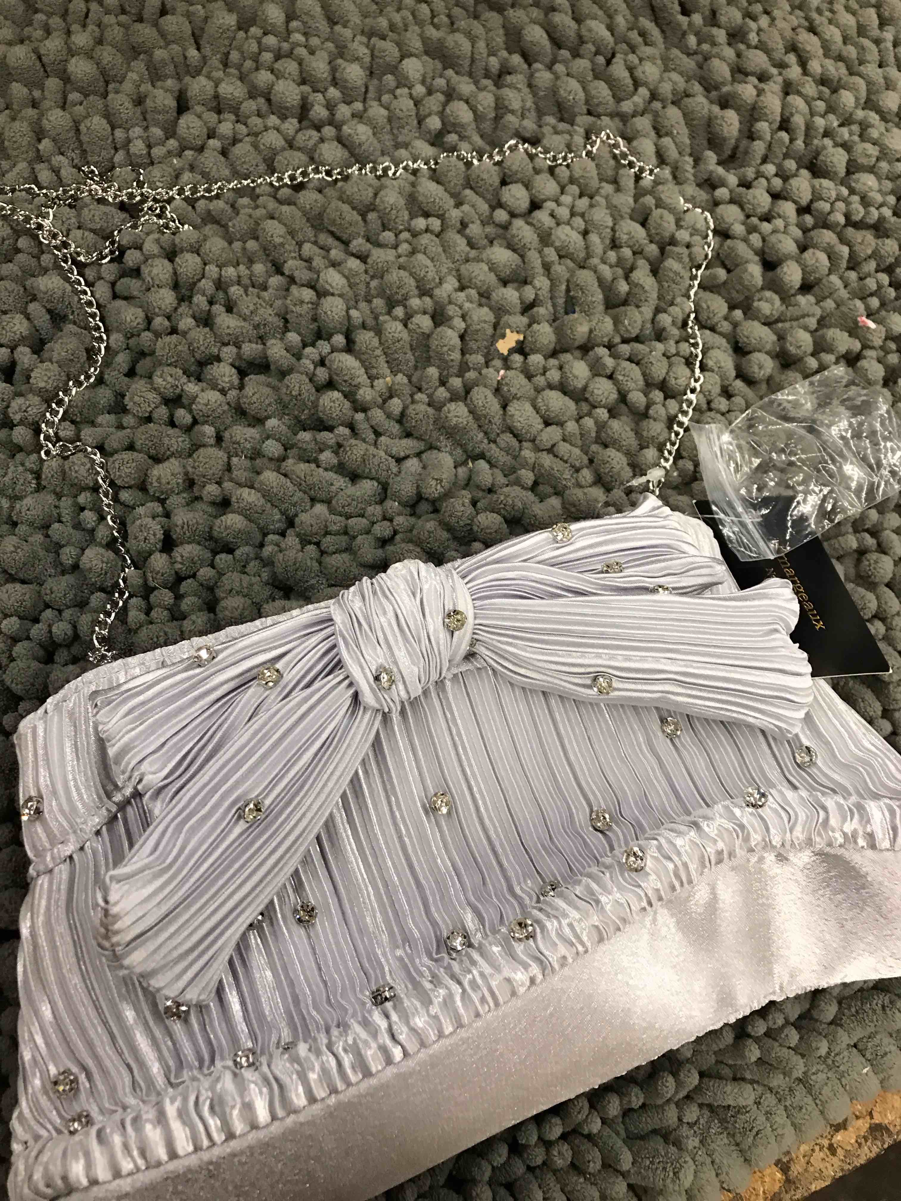 Condition photo showing New/Like New for d’margeaux purse